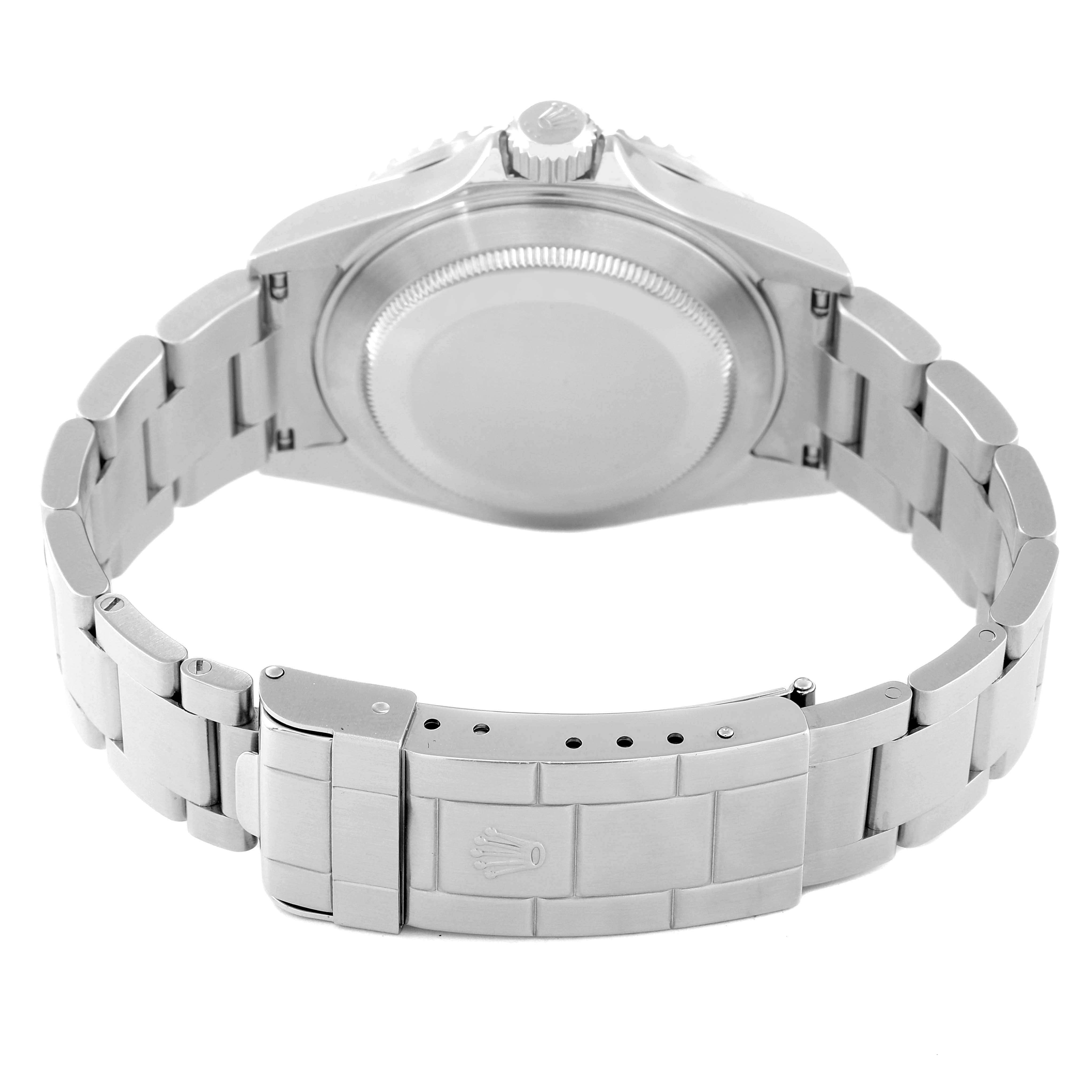 The image shows the back view of a Rolex Submariner 16610 Men
s Stainless Steel Black Dial 16610 Men
s Stainless Steel Black Dial watch, highlighting the case back and stainless steel bracelet.