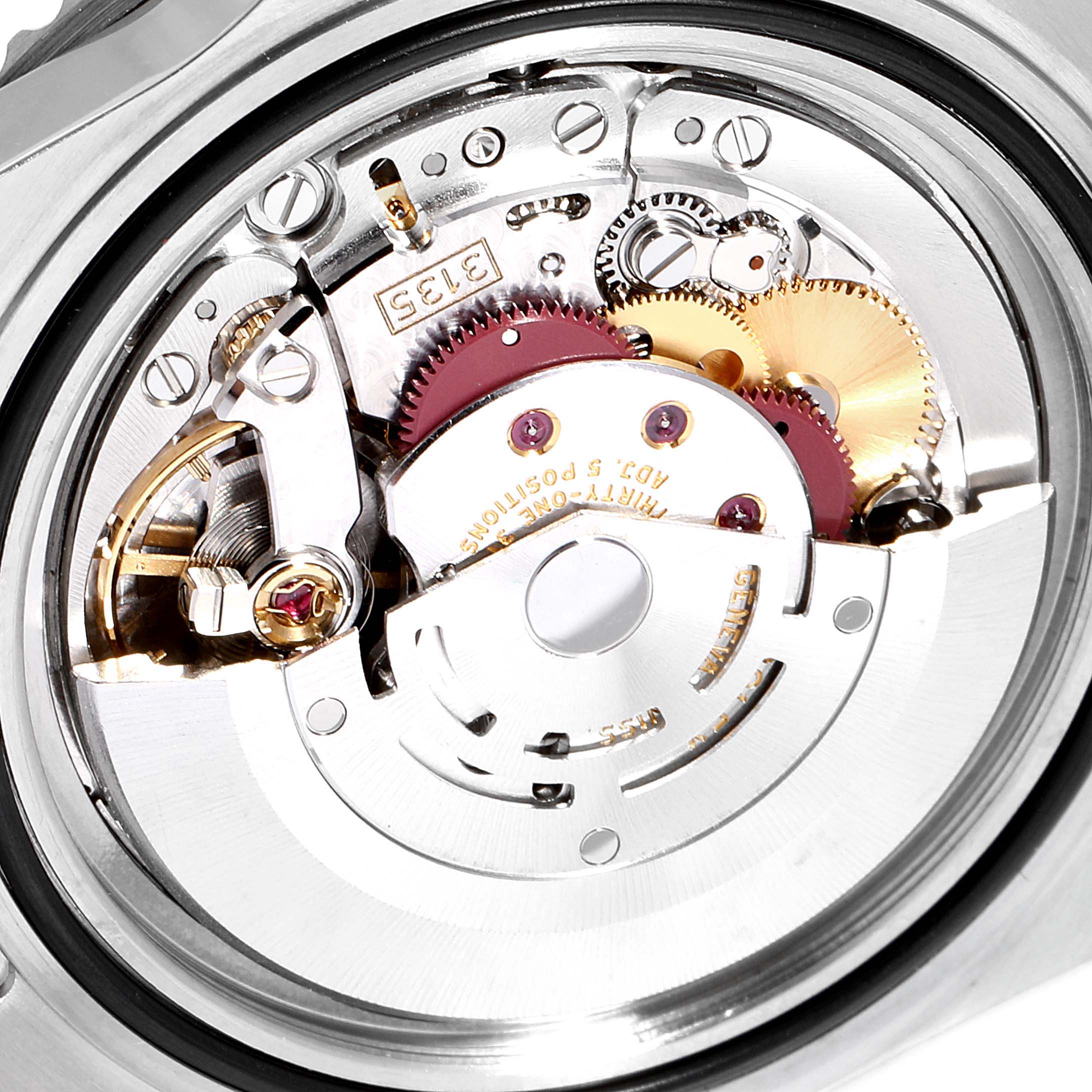 The image shows the inner mechanism and movement of a Rolex Submariner 16610 Men
s Stainless Steel Black Dial 16610 Men
s Stainless Steel Black Dial watch from the back angle.