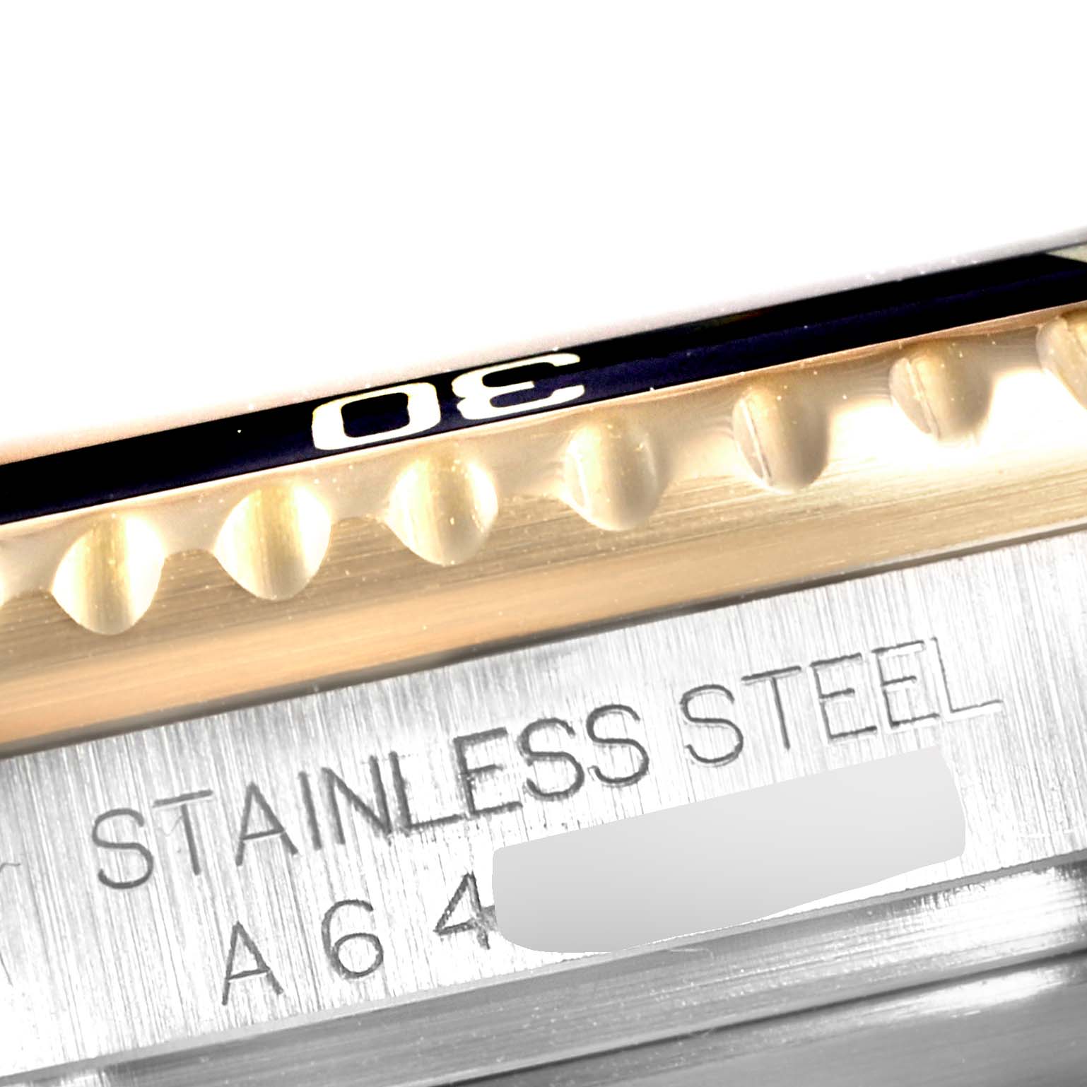 The image focuses on the bezel and casing of a Rolex Submariner 16613 Men's Steel and Gold (two tone) Black Dial 16613 Men's Steel and Gold (two tone) Black Dial, showcasing the "30" marker and "STAINLESS STEEL" engraving.