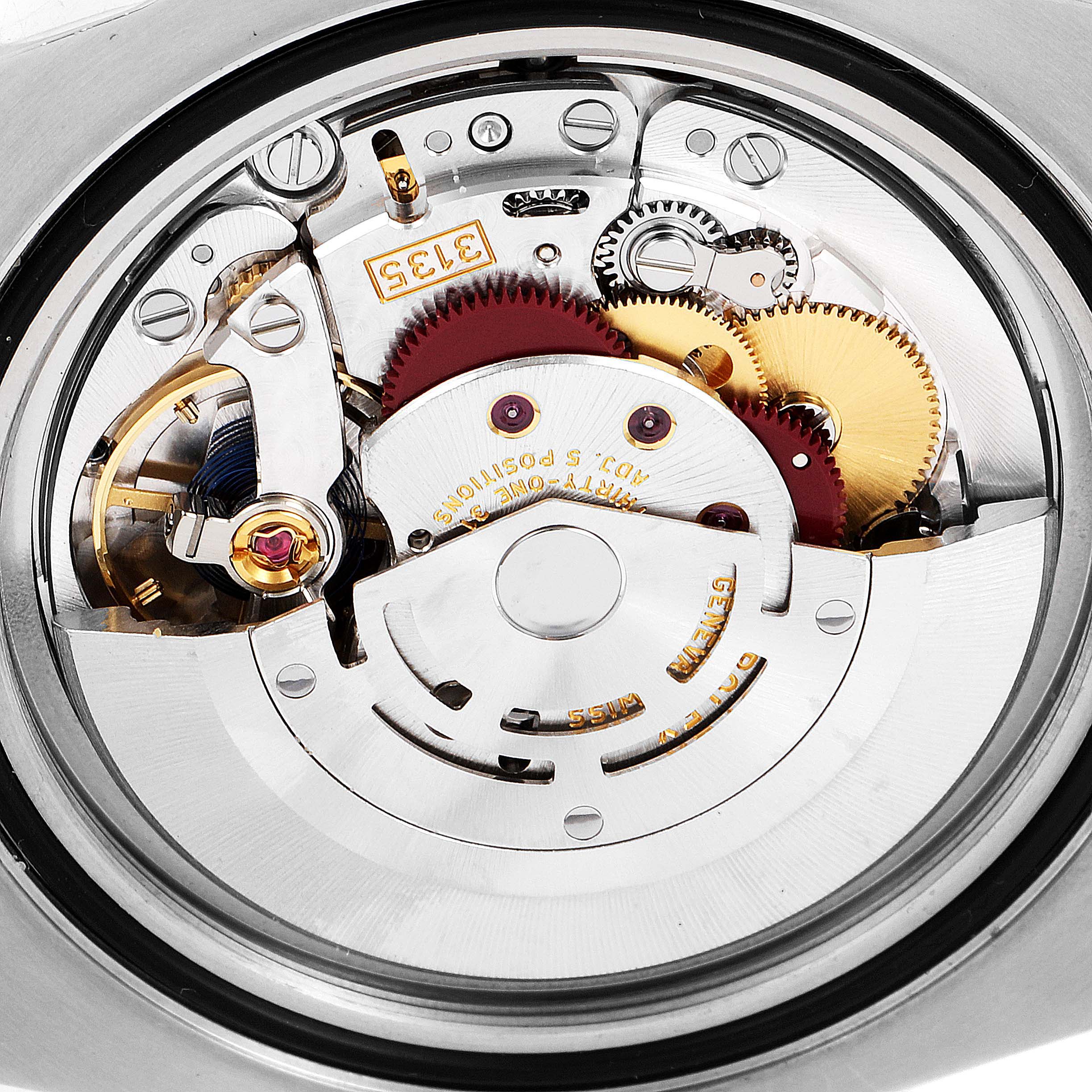 This image shows a close-up view of the movement mechanism of the Rolex Submariner 116613 Men
s Steel and Gold (two tone) Black Dial 116613 Men
s Steel and Gold (two tone) Black Dial watch.