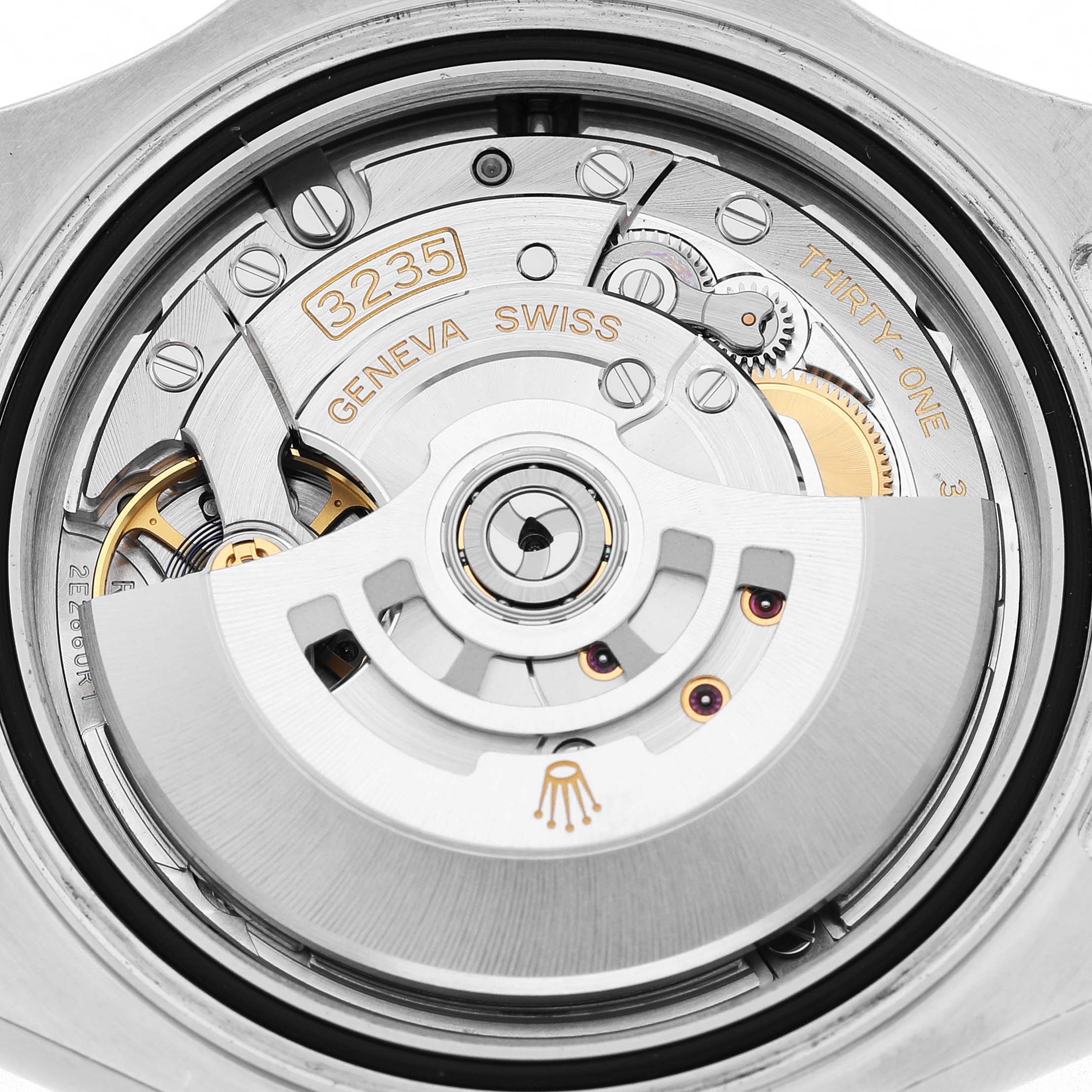 The image shows the movement of a Rolex Yacht-Master 126622 Men's Stainless Steel Blue Dial watch, focusing on its mechanism and rotor details.