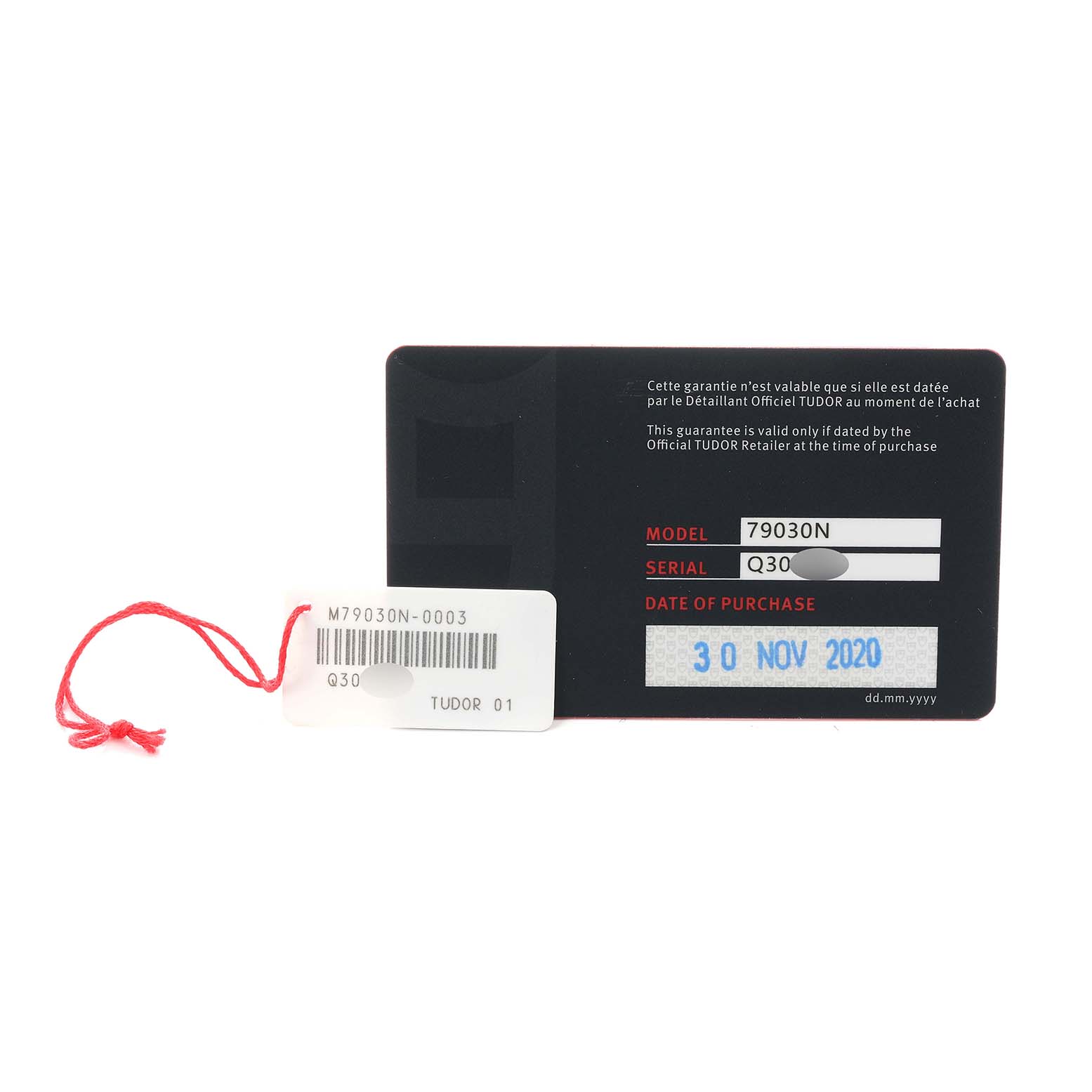 The image shows a warranty card and tag for the Tudor Heritage Black Bay 79030N Men
s Stainless Steel Black Dial model, displaying model and purchase details.