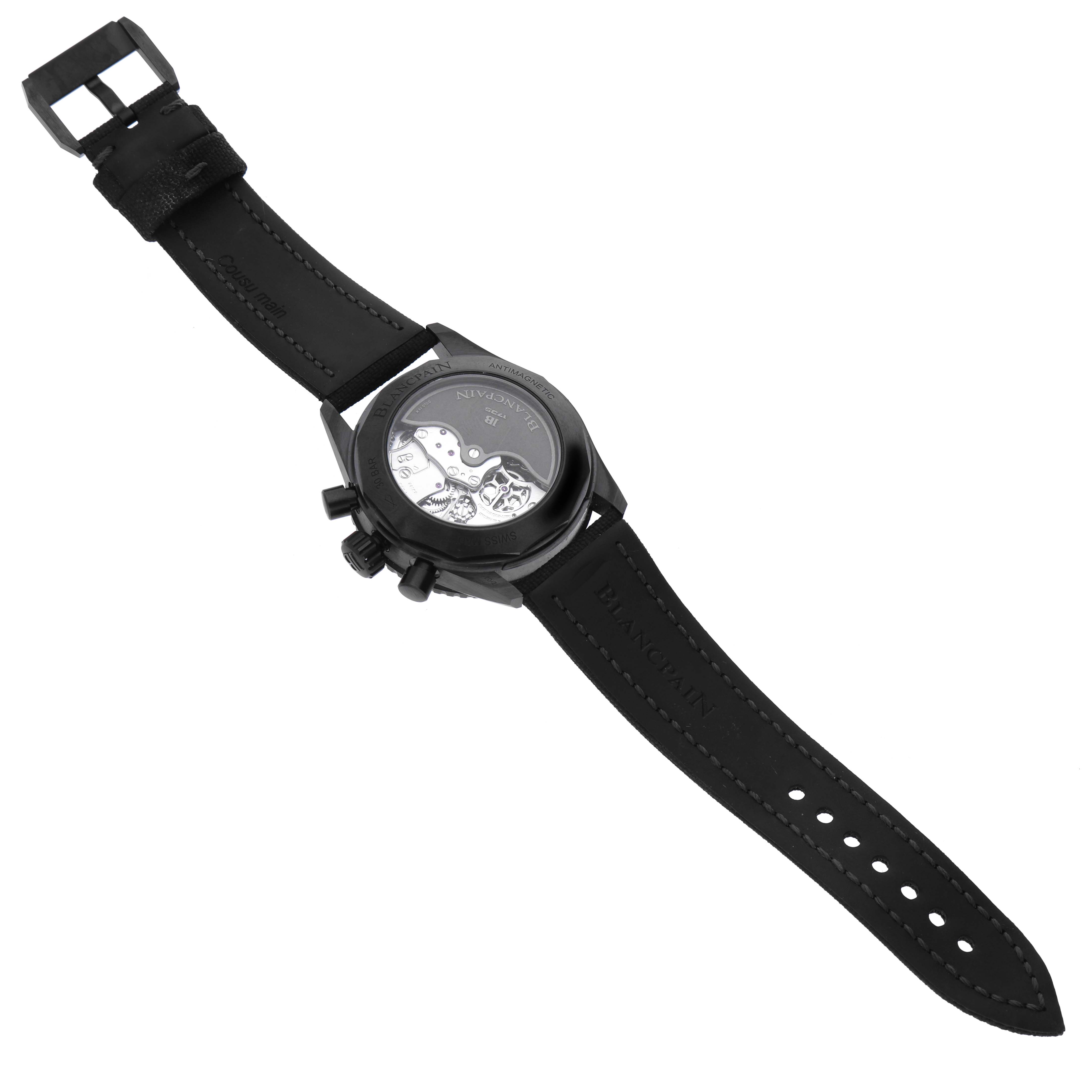 The image shows the rear view of a Blancpain Fifty Fathoms 5200-0130-B52A Men's Ceramic Black Dial 5200-0130-B52A Men's Ceramic Black Dial watch, highlighting its exposed movement and black strap.