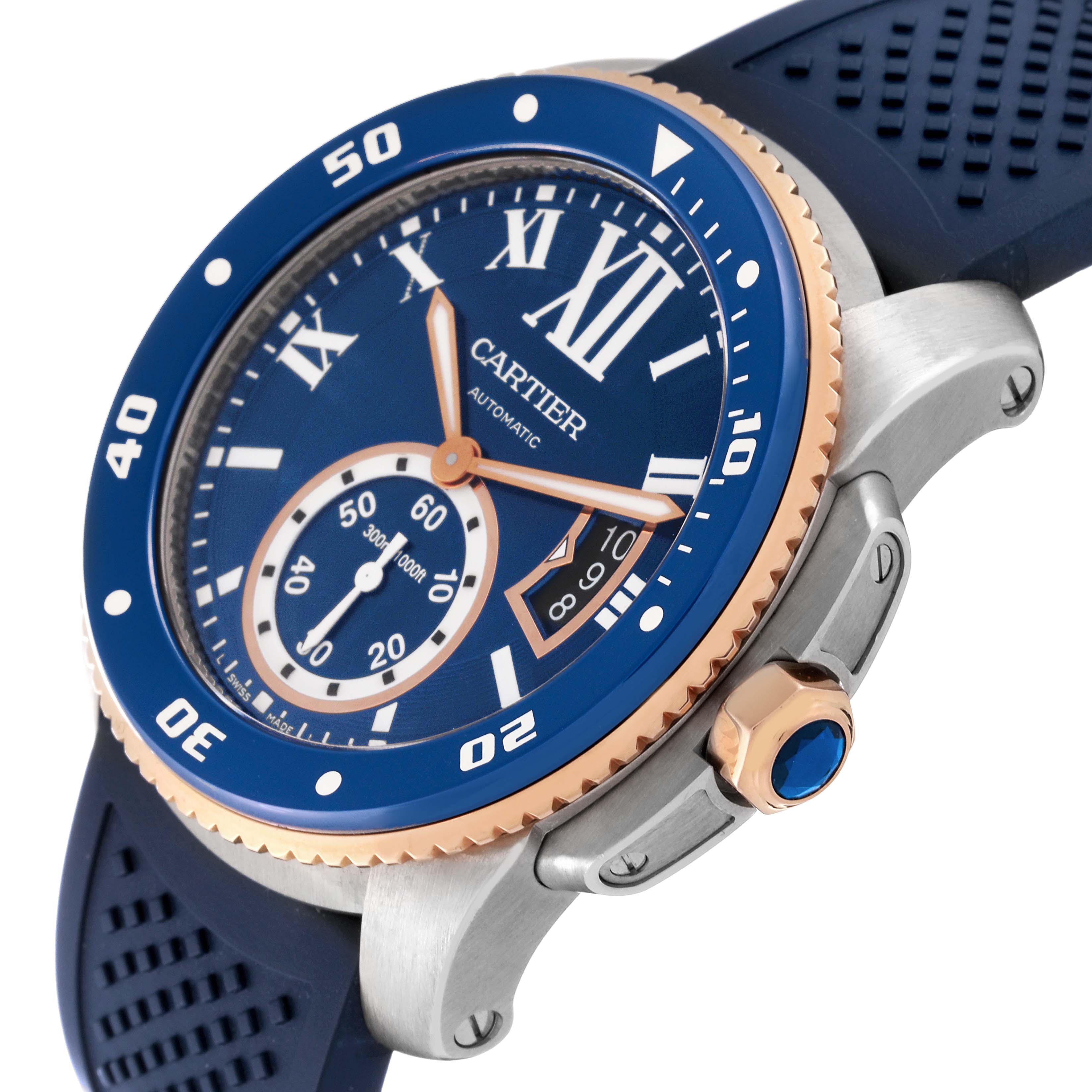 The image shows a close-up side angle of the Calibre de Cartier watch by Cartier, featuring the bezel, crown, and part of the strap.