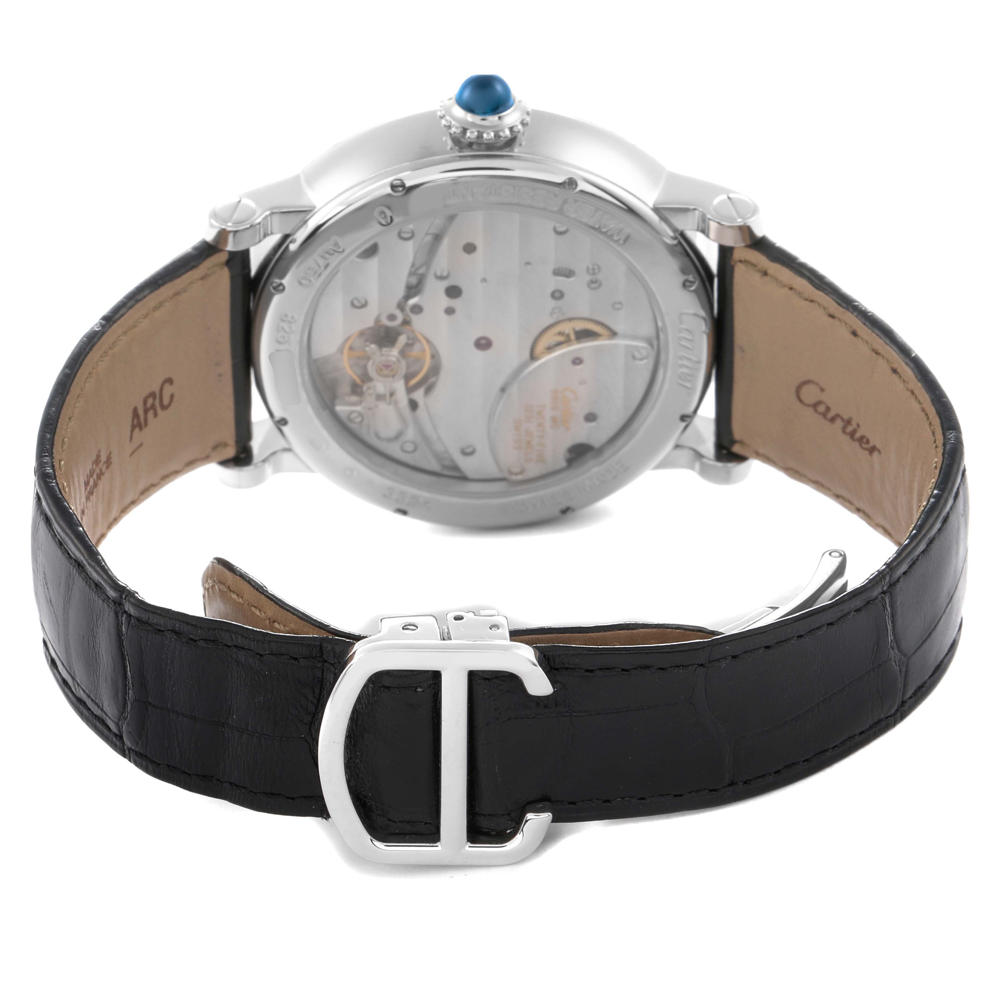 The image shows the back view of the Cartier Rotonde model W1556202 watch, highlighting its transparent case back, crown, and leather strap with buckle.