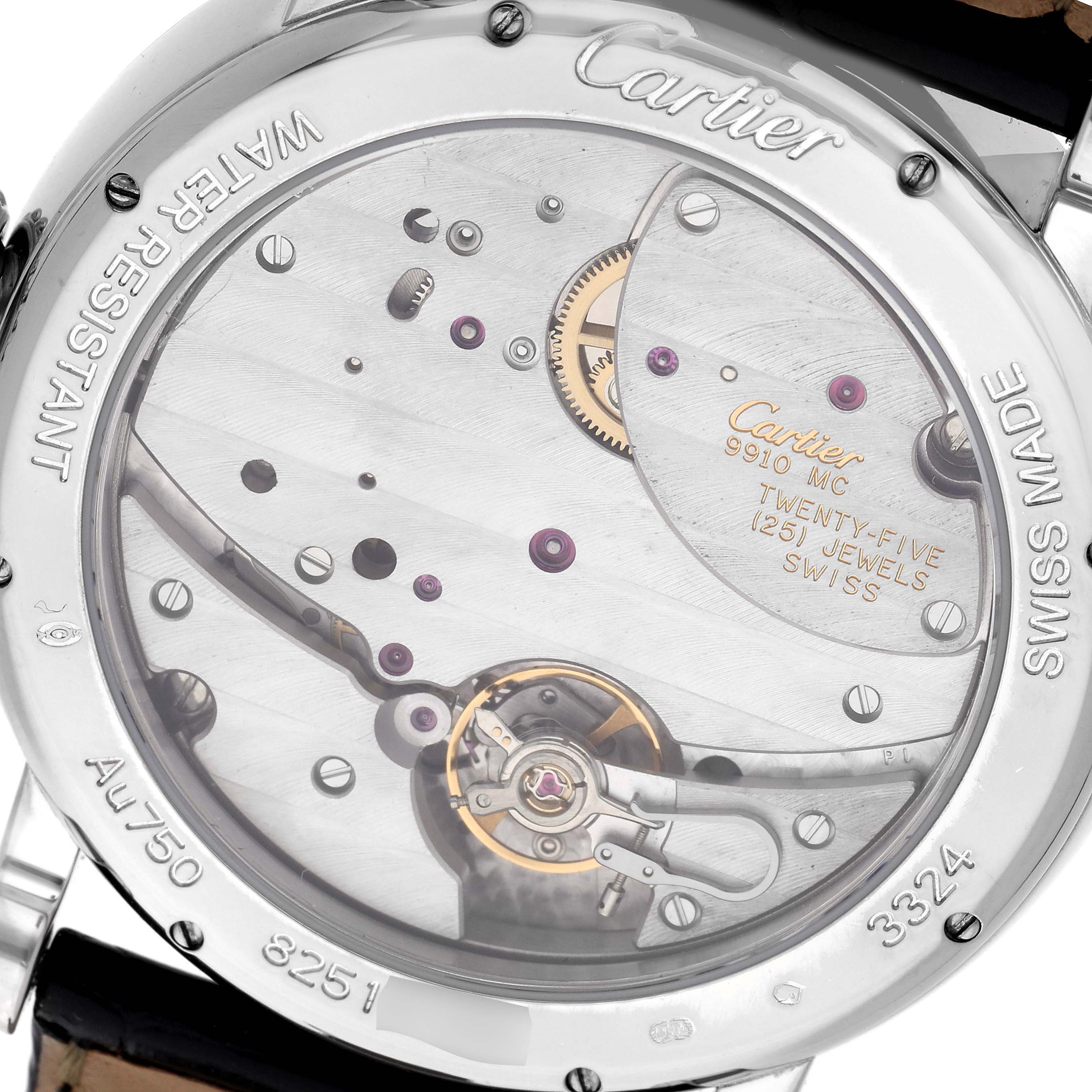 The image shows the back view of a Cartier Rotonde model number W1556202, displaying its exposed movement and engraved details on the case back.