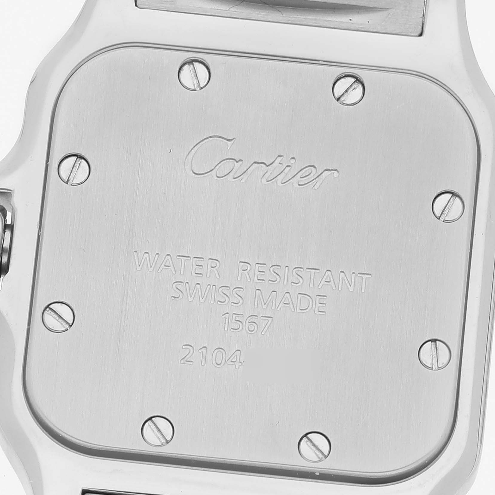 This image shows the back case of a Santos model by Cartier, highlighting the water resistance and Swiss-made engravings.