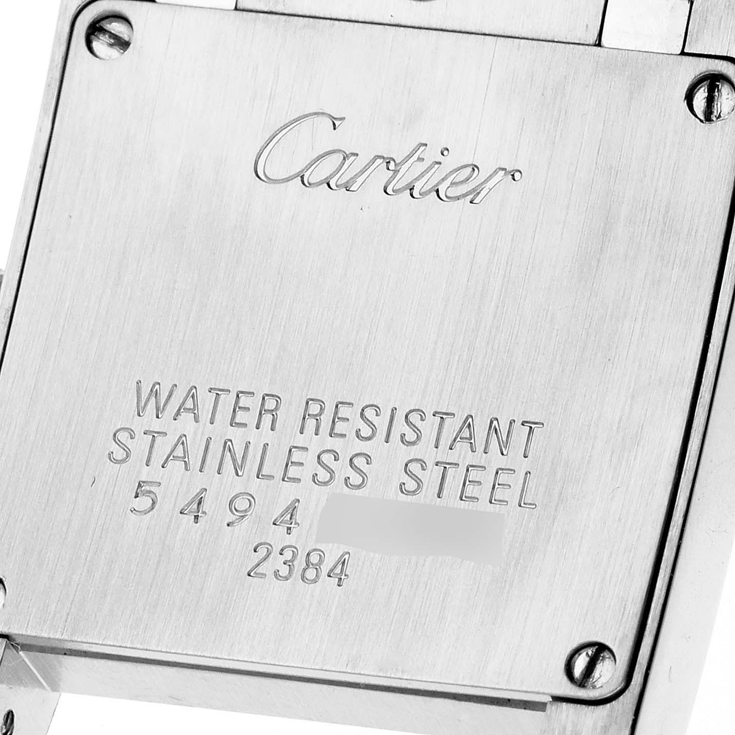 The image shows the backplate of a Cartier Tank Francaise W51028Q3 Women's Stainless Steel Mother of Pearl Dial W51028Q3 Women's Stainless Steel Mother of Pearl Dial watch with engravings indicating water resistance and stainless steel material.