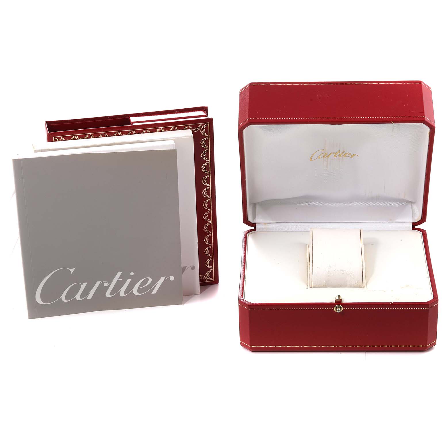 The image shows the packaging and documentation for a Cartier Tank Française model, including the watch box and booklets.