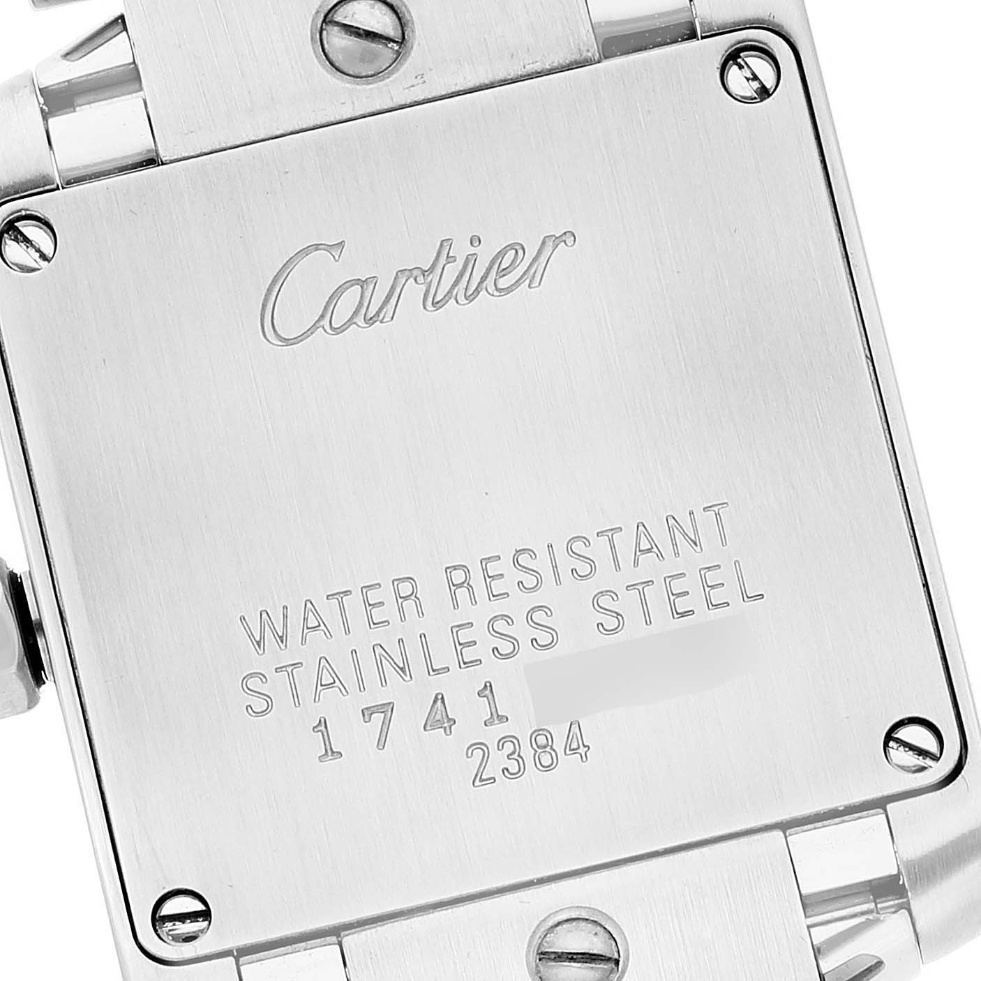 The image shows the back case of the Cartier Tank Francaise W51008Q3 Women
s Stainless Steel Silver Dial W51008Q3 Women
s Stainless Steel Silver Dial watch, displaying inscriptions about water resistance and material.