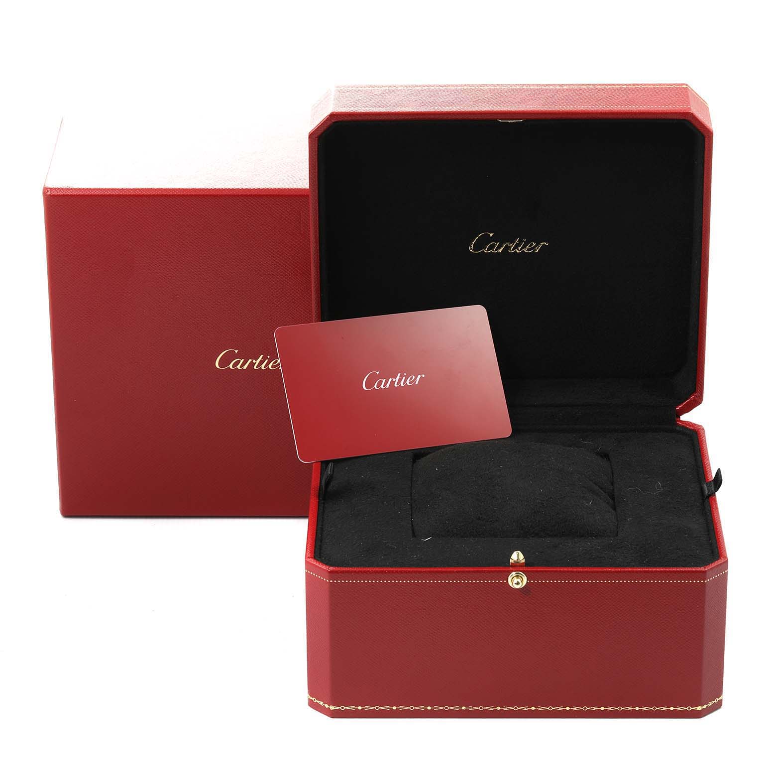 The image shows an open red Cartier box and a card, used for storing the Tank Louis Cartier model watch.