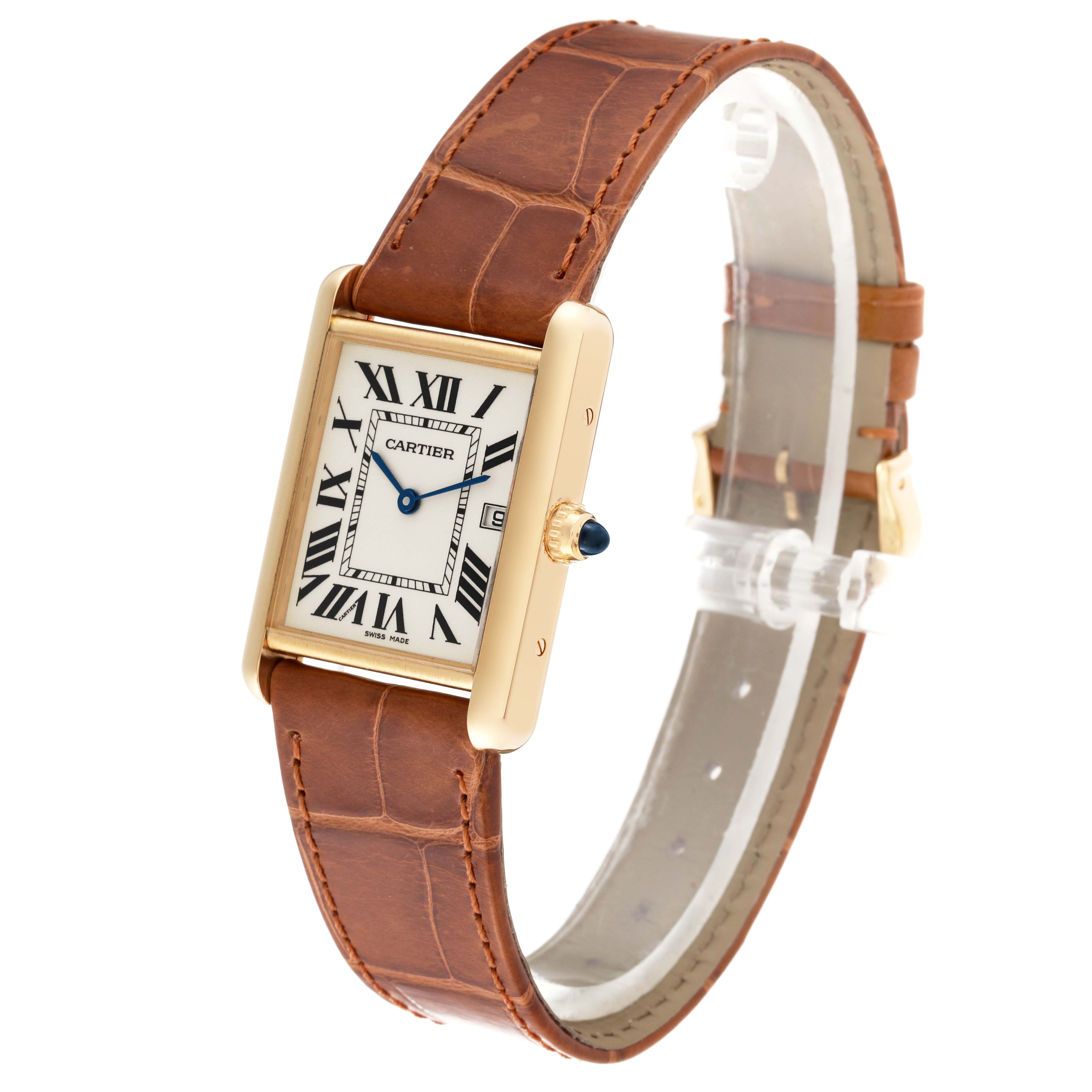 The Cartier Tank Louis W1529756 Men's Yellow Gold Silver Dial W1529756 Men's Yellow Gold Silver Dial watch is shown at a slight angle, revealing its face, brown leather strap, and side view of the case with the crown.