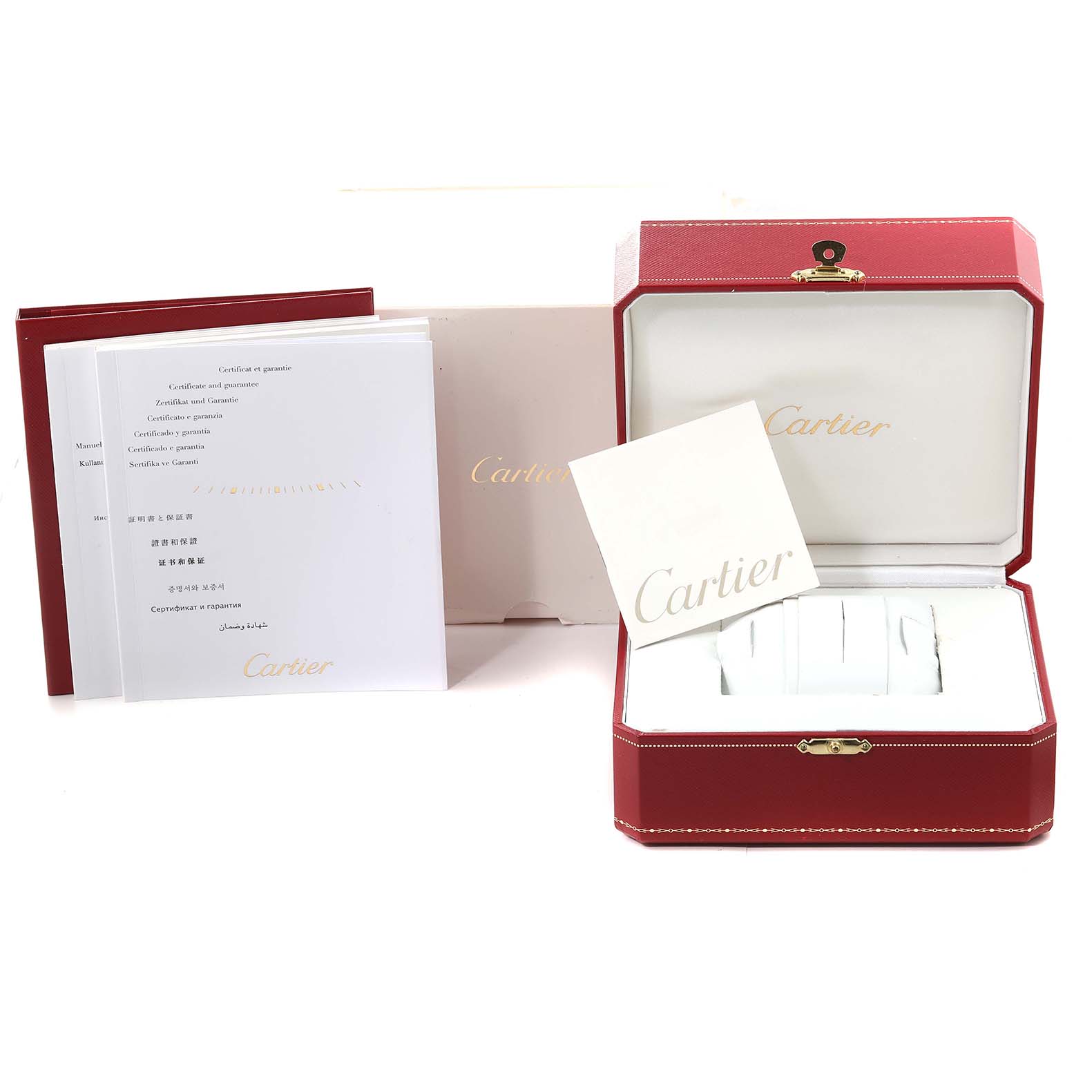 The image shows the packaging and documentation for the Cartier Tank MC W5330003 Men
s Stainless Steel Silver Dial W5330003 Men
s Stainless Steel Silver Dial watch, including the box, warranty booklet, and card.