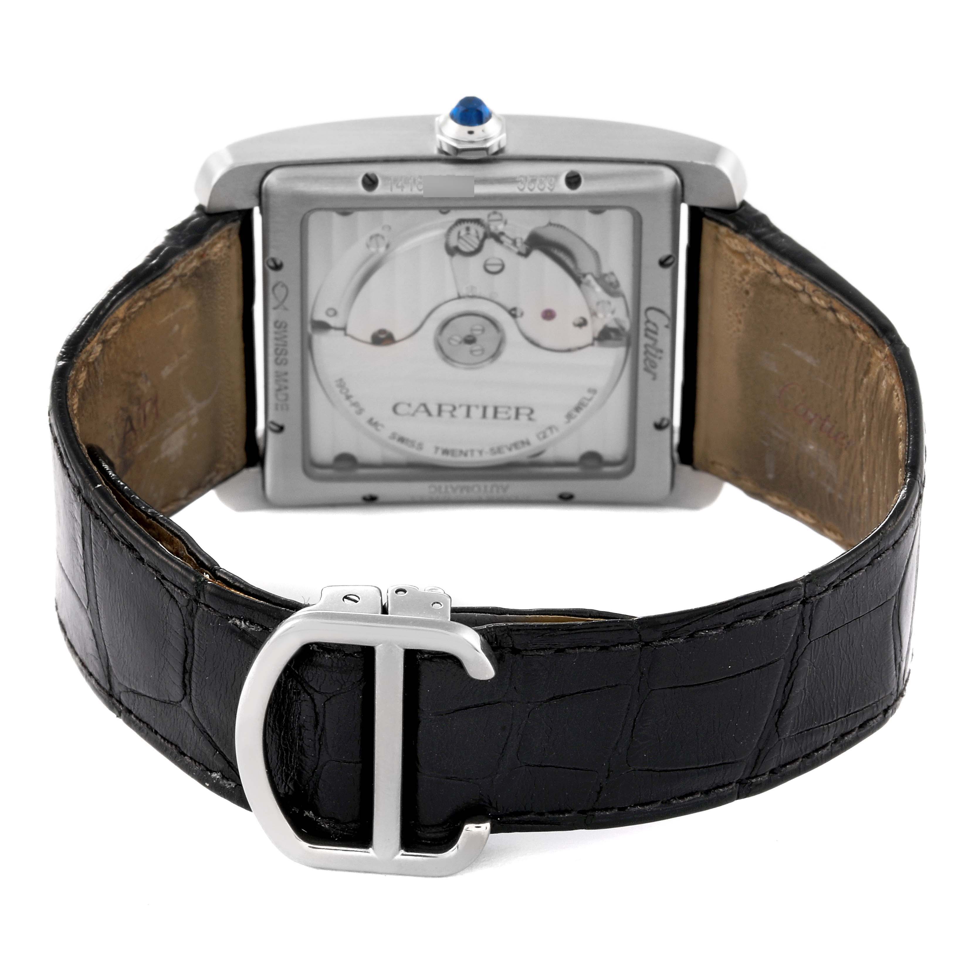 The image shows the back view of the Cartier Tank MC W5330003 Men
s Stainless Steel Silver Dial W5330003 Men
s Stainless Steel Silver Dial watch, featuring its movement and black leather strap with a 
C
 buckle.