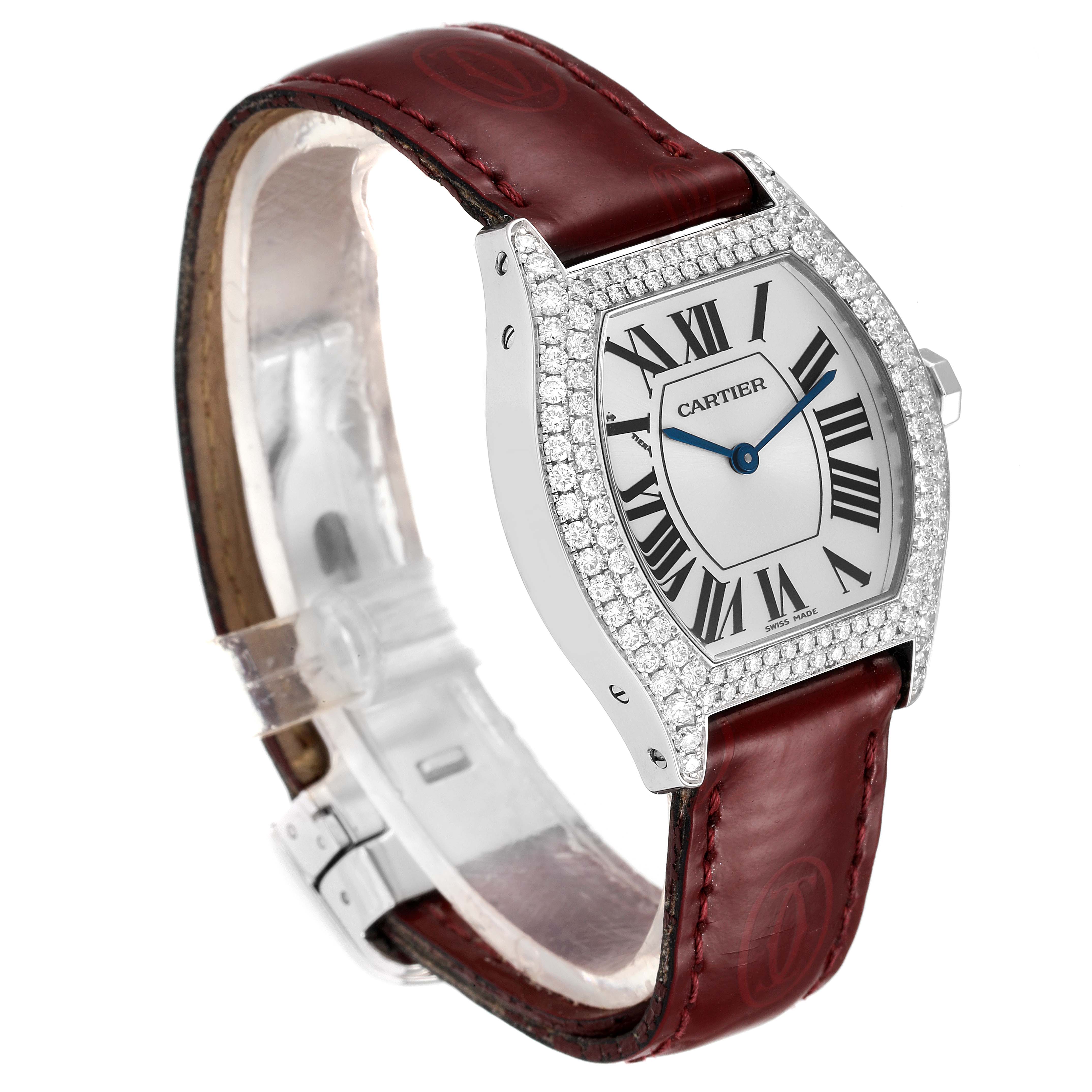 This Cartier Tortue 2644 Women's White Gold Silver Dial 2644 Women's White Gold Silver Dial model watch is shown at a three-quarter angle, highlighting its face, bezel, and leather strap.