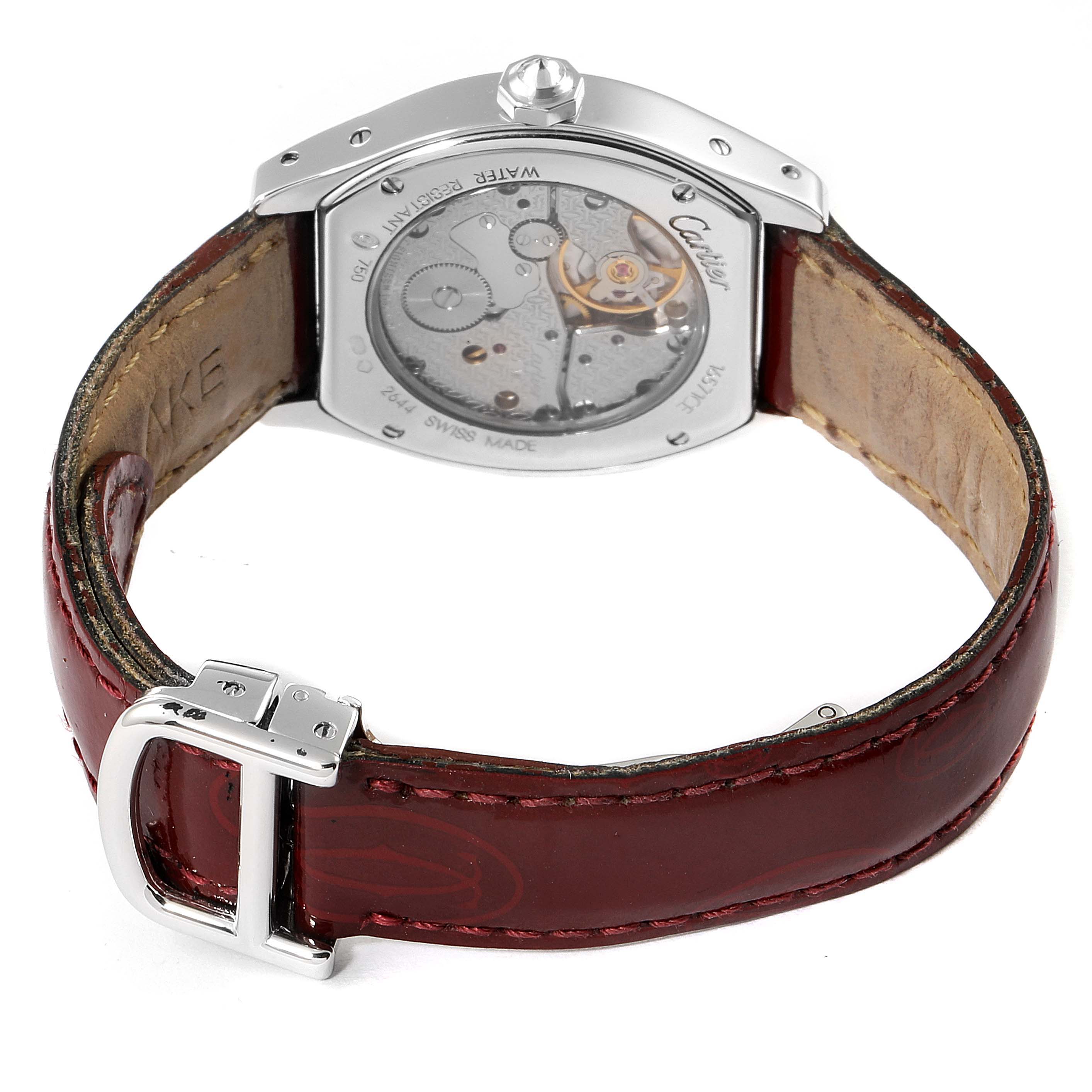 The image shows the back view of a Cartier Tortue 2644 Women's White Gold Silver Dial 2644 Women's White Gold Silver Dial watch, including the movement through the transparent case back and the leather strap.