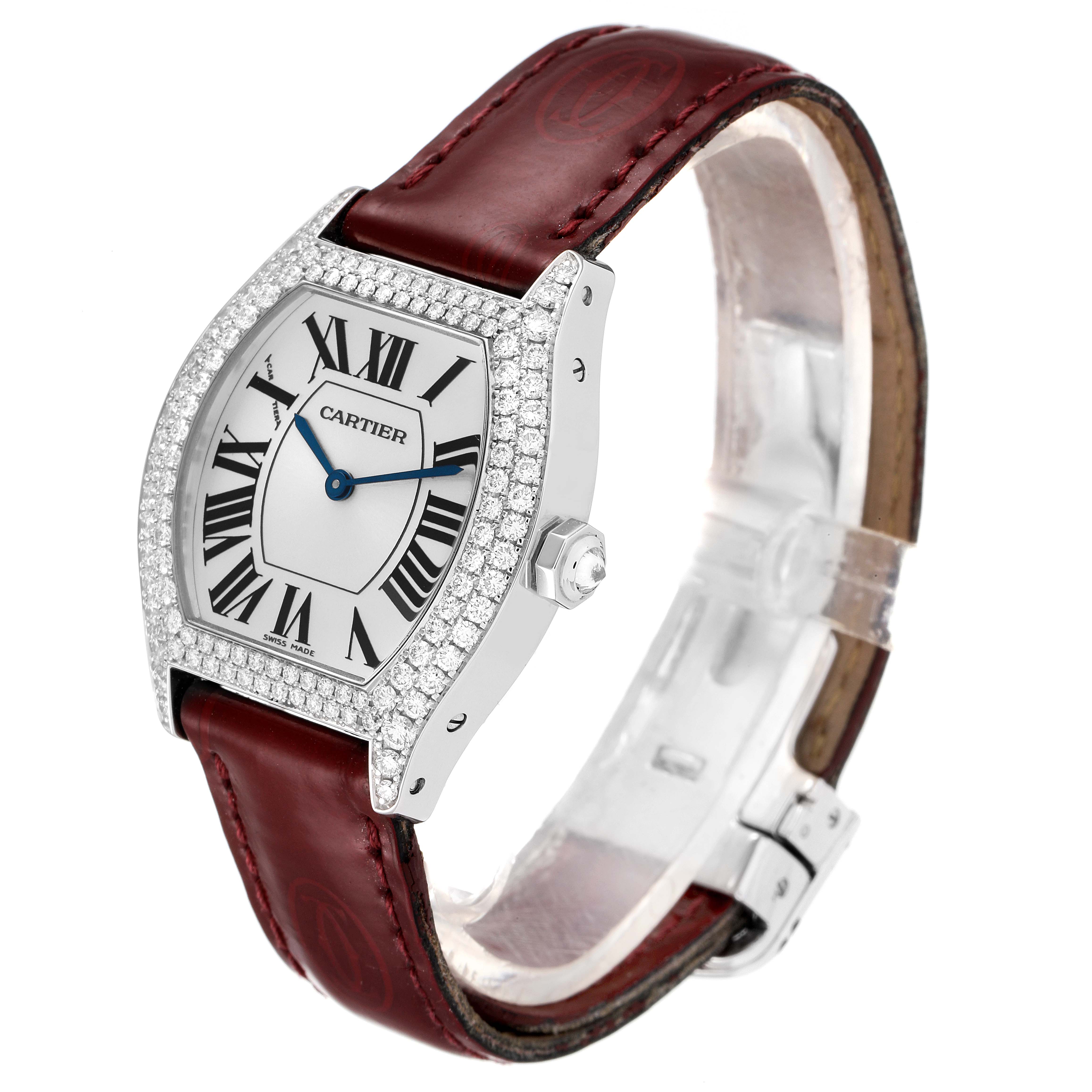 The image shows a Cartier Tortue 2644 Women's White Gold Silver Dial 2644 Women's White Gold Silver Dial watch at a 3/4 angle, highlighting its face, diamond bezel, and burgundy leather strap.