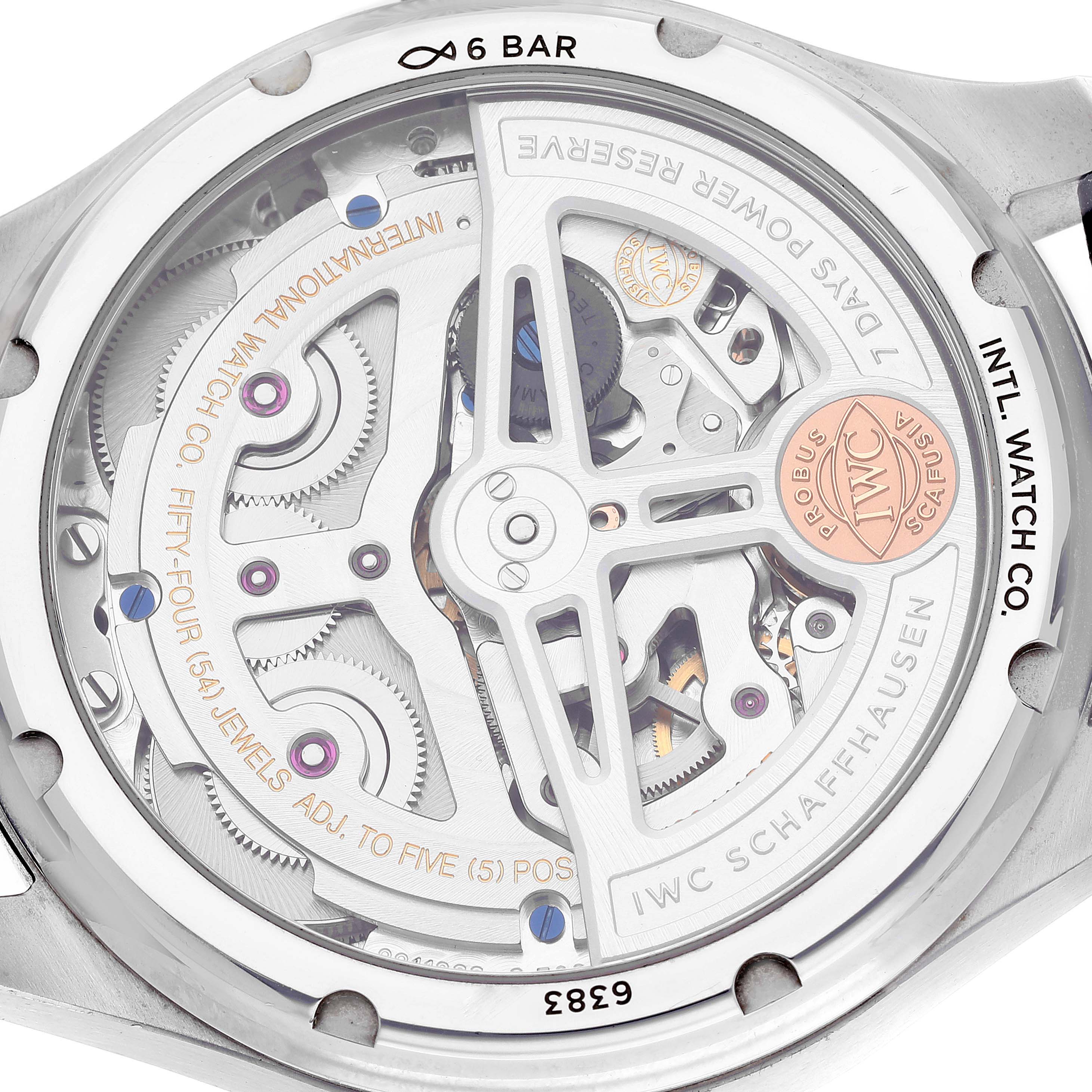 This image shows the back of an IWC Pilot IW503605 Men's Stainless Steel Blue Dial IW503605 Men's Stainless Steel Blue Dial model watch, highlighting its intricate internal mechanisms and inscriptions.