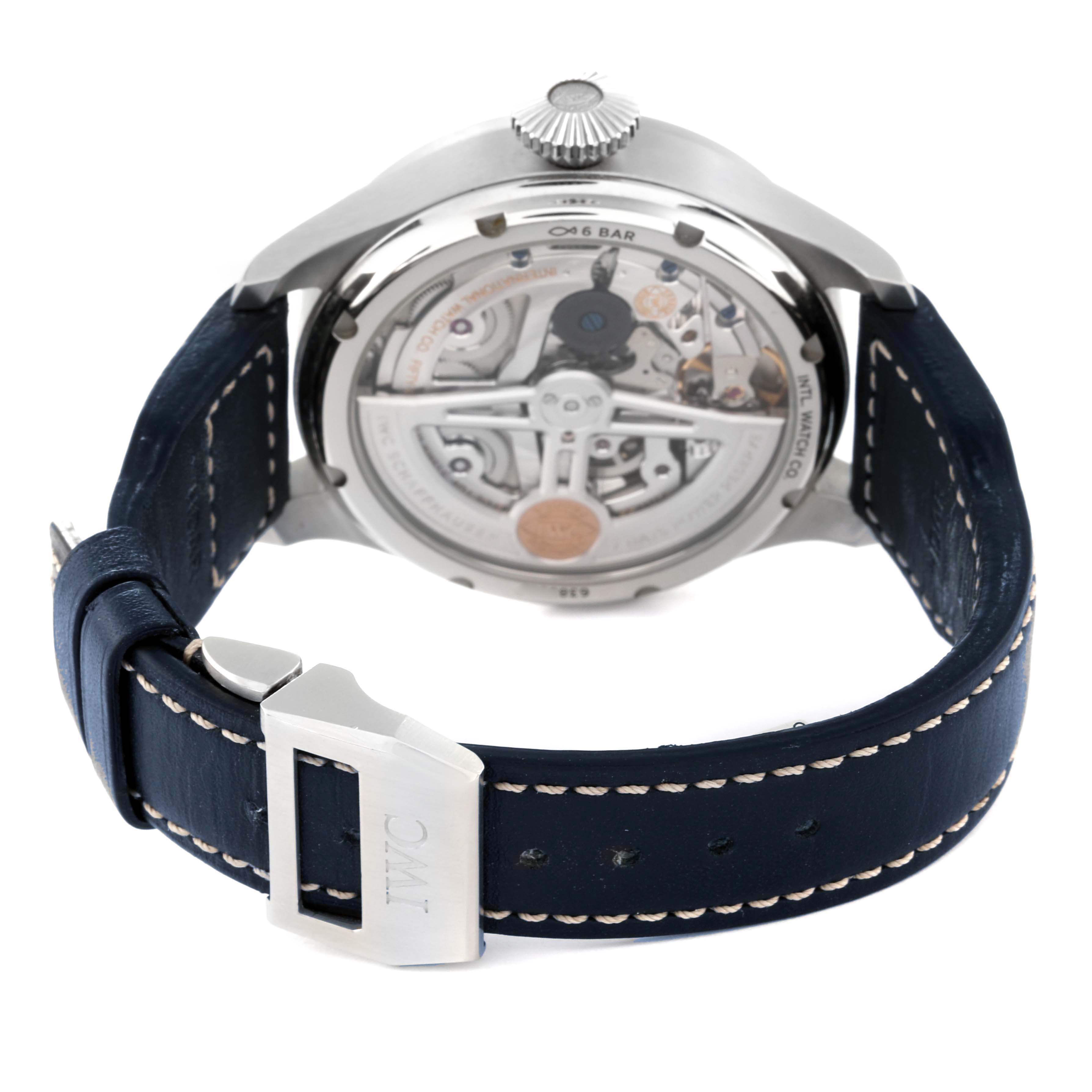 The image shows the back and side view of an IWC Pilot IW503605 Men's Stainless Steel Blue Dial IW503605 Men's Stainless Steel Blue Dial watch, highlighting its inner mechanisms and blue leather strap.