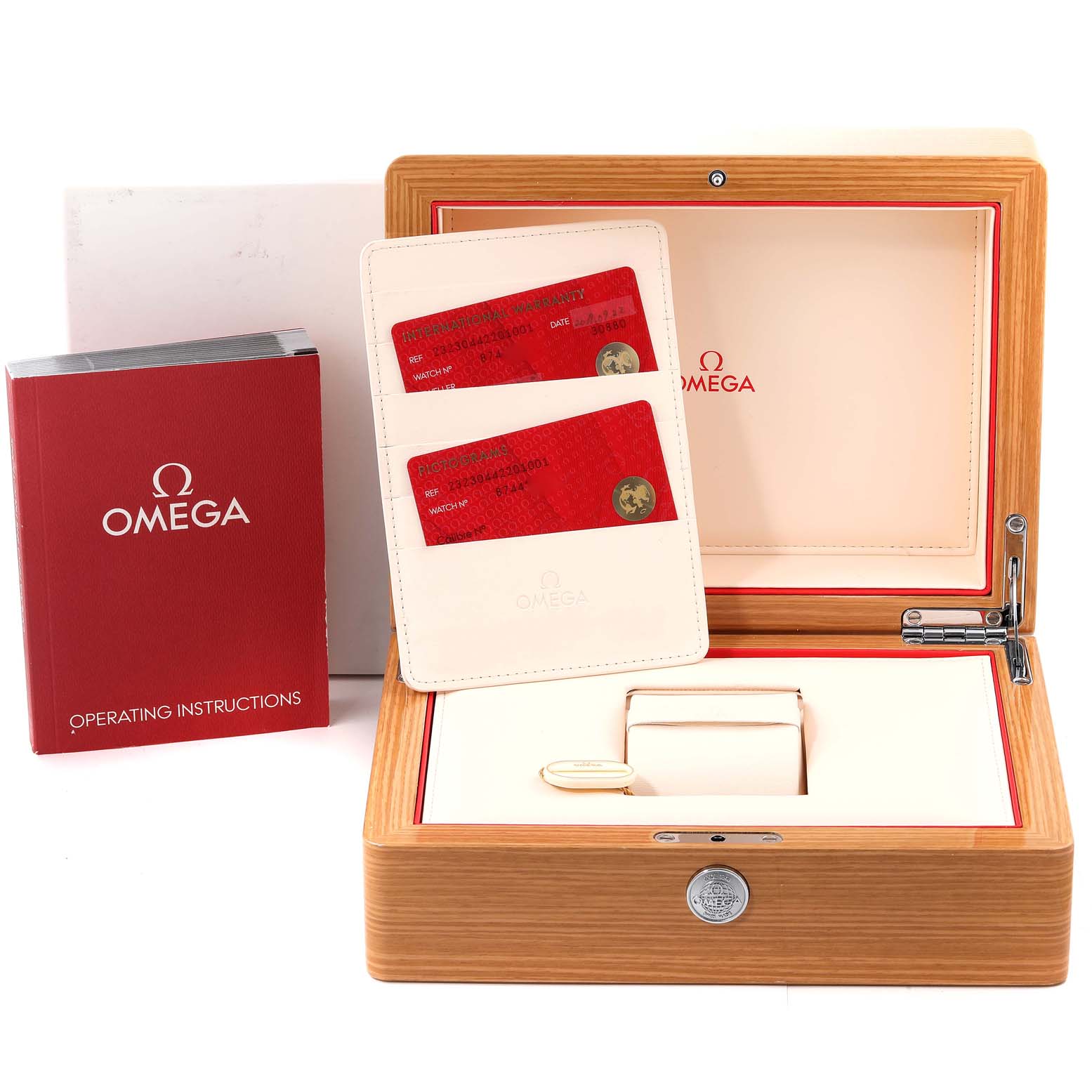 The image shows an open Omega Planet Ocean 232.30.44.22.01.001 Men
s Stainless Steel Black Dial 232.30.44.22.01.001 Men
s Stainless Steel Black Dial watch box with warranty cards and operating instructions.