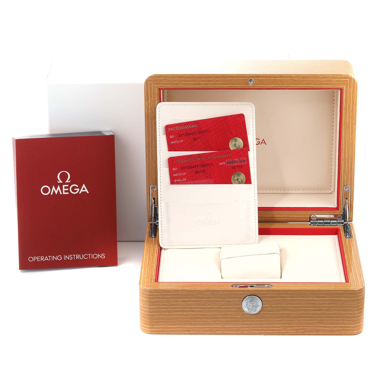 The image shows the open box of an Omega Speedmaster 331.20.42.51.02.001 Men's Steel and Gold (two tone) Silver Dial 331.20.42.51.02.001 Men's Steel and Gold (two tone) Silver Dial watch with warranty cards and a user manual.