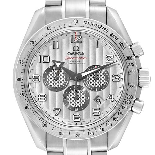 The image shows a front view of the Omega Speedmaster watch, displaying the dial, chronographs, and tachymeter scale.