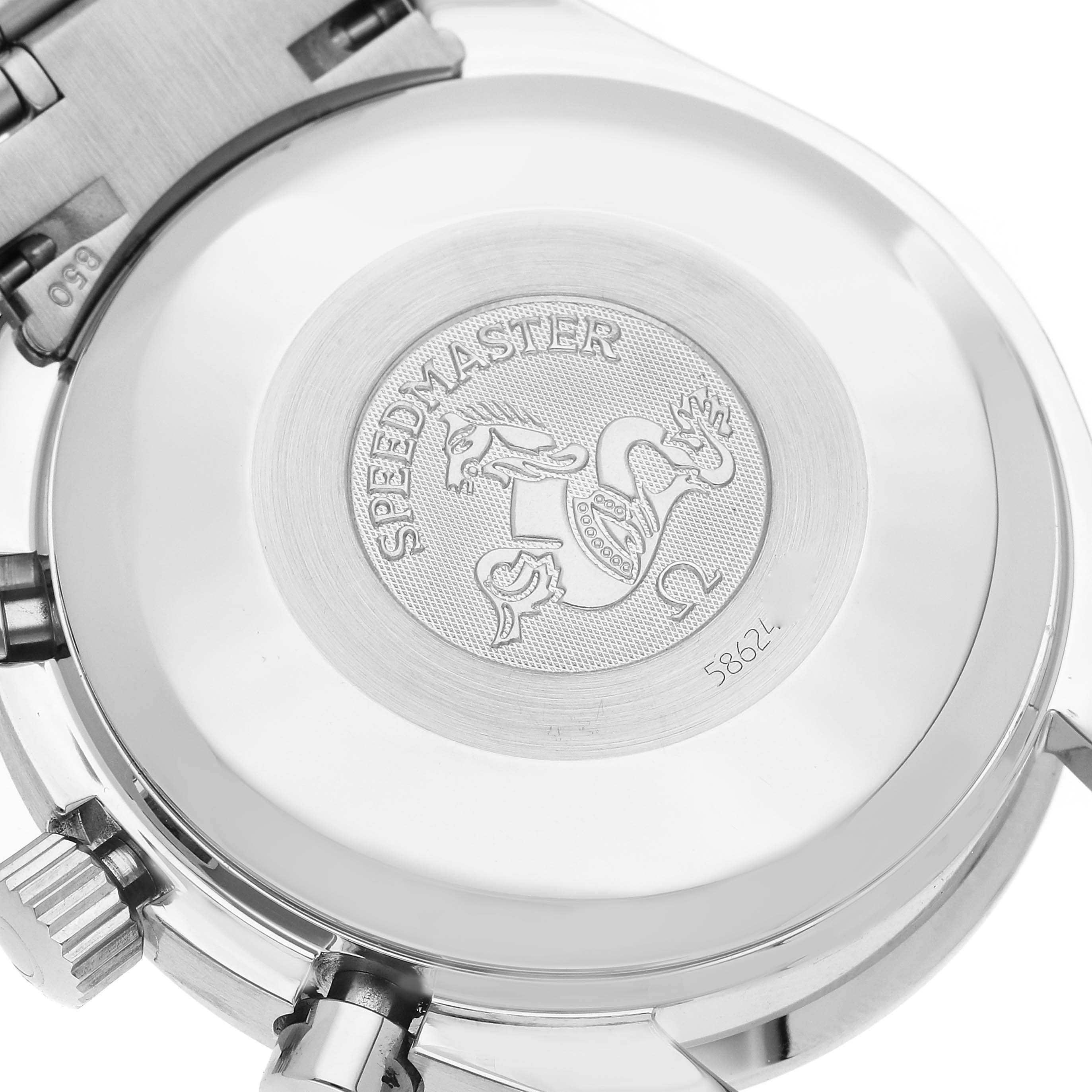 The image shows the back case and part of the bracelet of an Omega Speedmaster 3523.80.00 Men
s Stainless Steel Blue Dial 3523.80.00 Men
s Stainless Steel Blue Dial watch, focused on its engraved emblem.