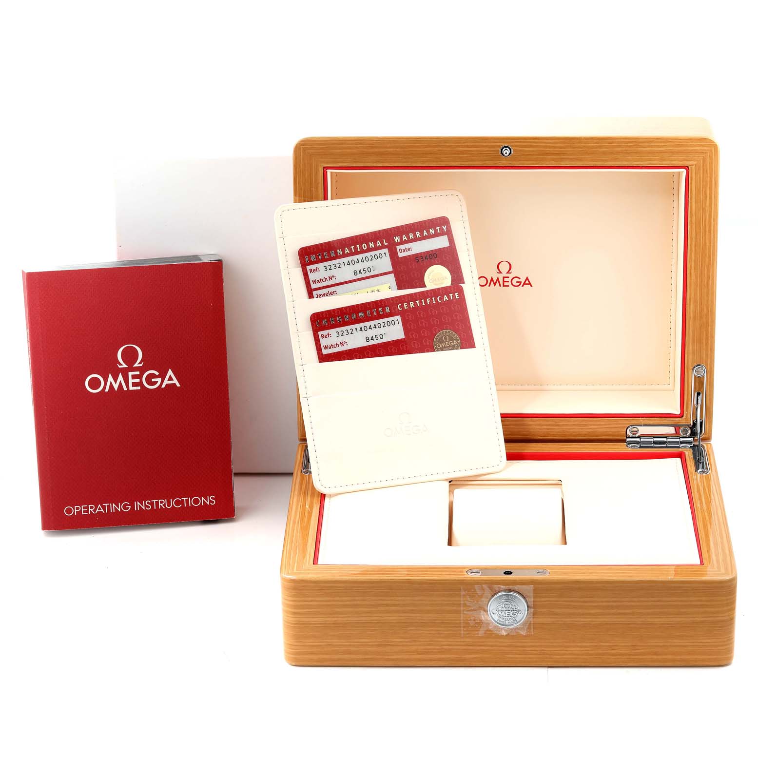 This image shows an Omega Speedmaster 323.21.40.44.02.001 Men's Steel and Gold (two tone) Silver Dial 323.21.40.44.02.001 Men's Steel and Gold (two tone) Silver Dial watch box, warranty cards, and operating instructions.