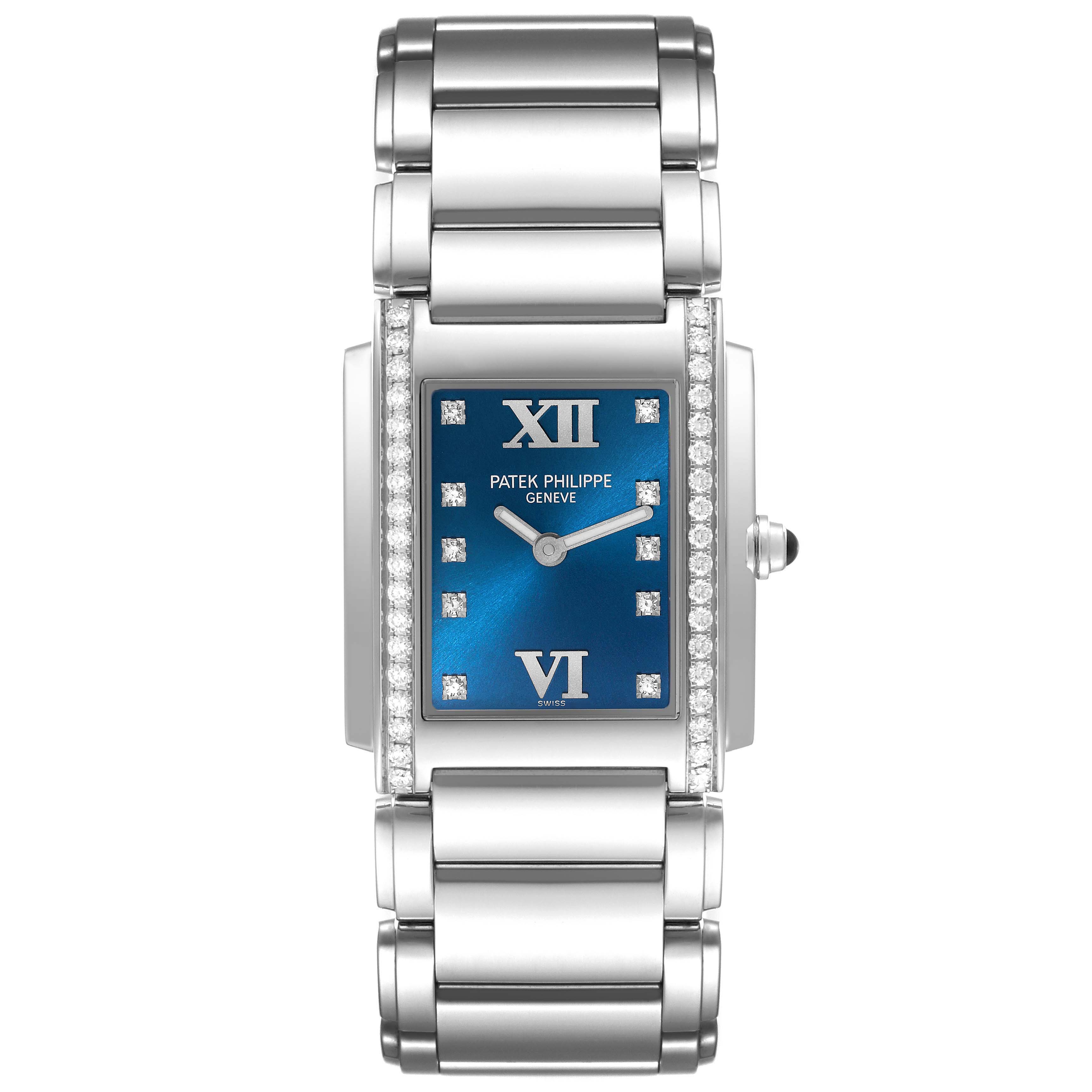 The image shows a Patek Philippe Twenty-4 4910/10A-012 Women's Stainless Steel Blue Dial 4910/10A-012 Women's Stainless Steel Blue Dial watch from a front angle, displaying its blue dial, diamond accents, and stainless steel bracelet.
