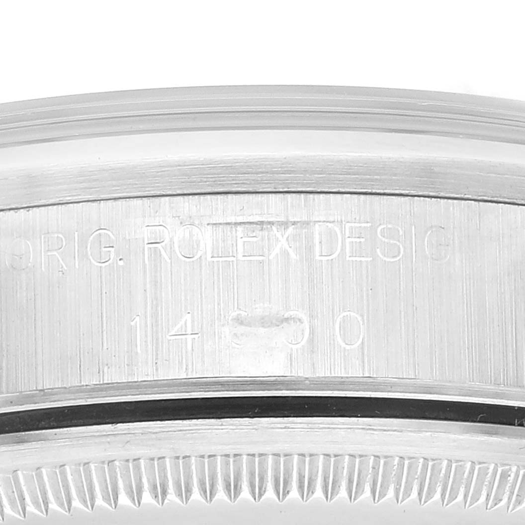 This image shows a close-up of the case side markings of an Air-King model by Rolex.