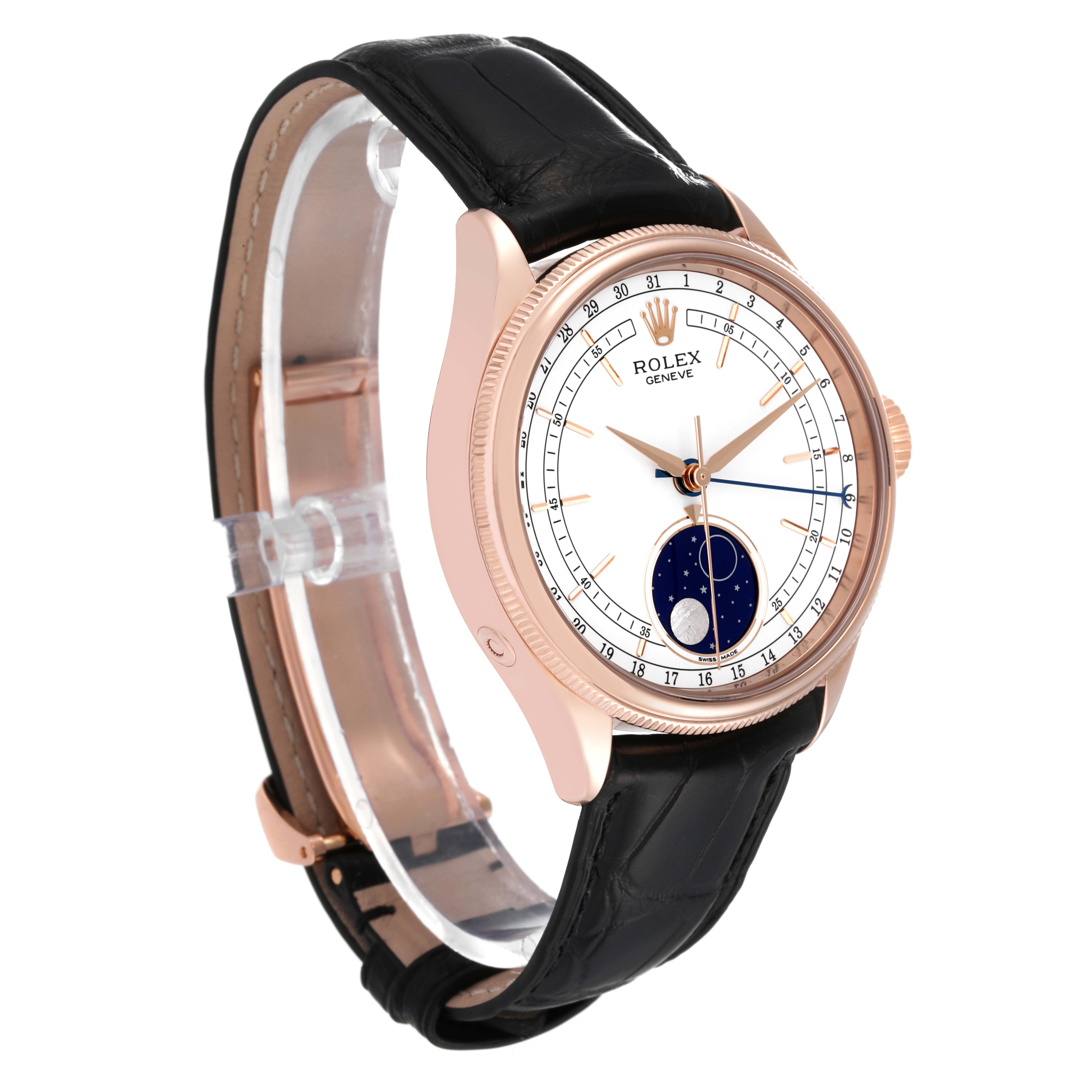 The Rolex Cellini 50535 Men's Rose Gold White Dial 50535 Men's Rose Gold White Dial watch is shown at a slight angle, highlighting its rose gold case, moon phase dial, and black leather strap.