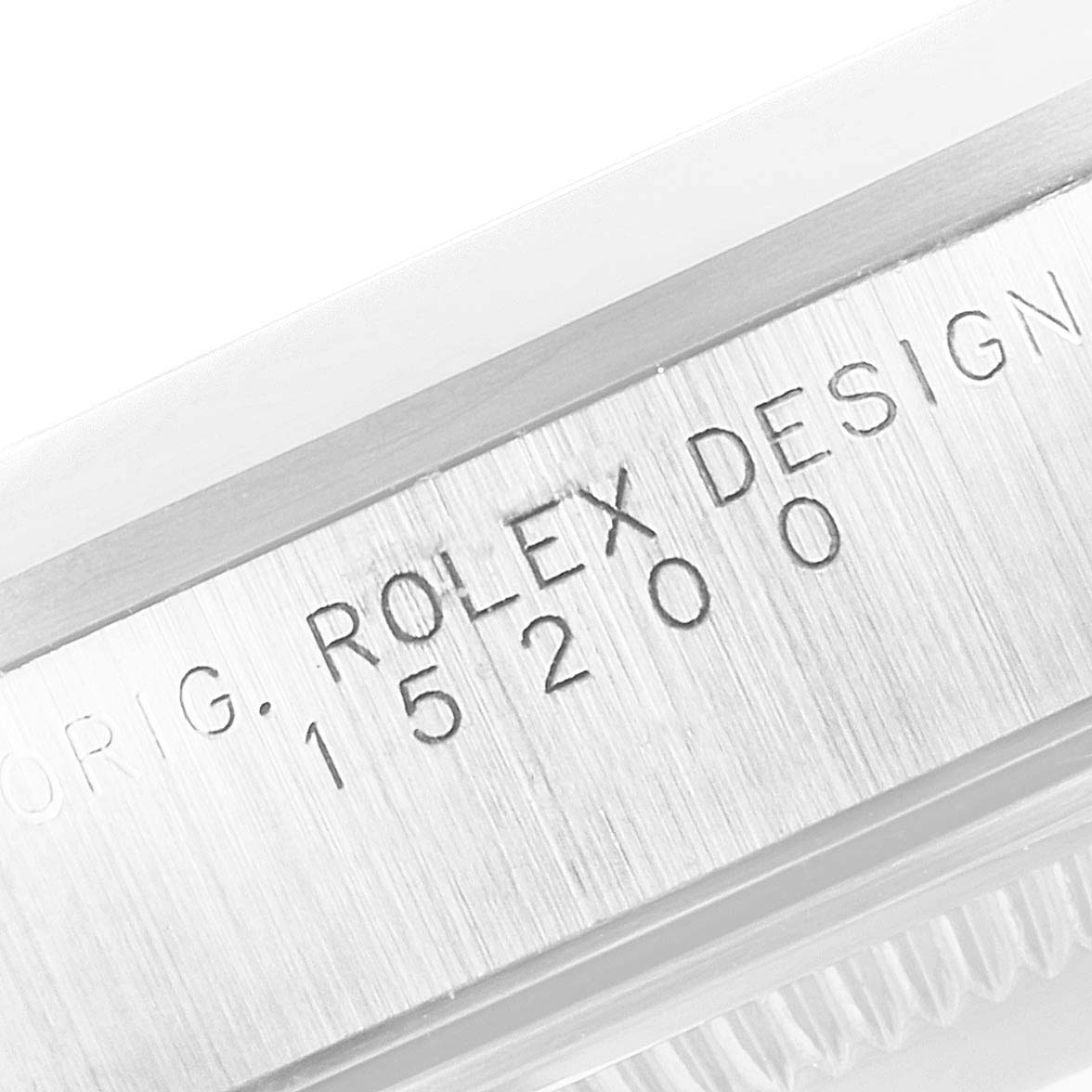 This image shows a close-up of the model and serial number engraved on the side of a Rolex Date 15200 Men's Stainless Steel Black Dial 15200 Men's Stainless Steel Black Dial watch.