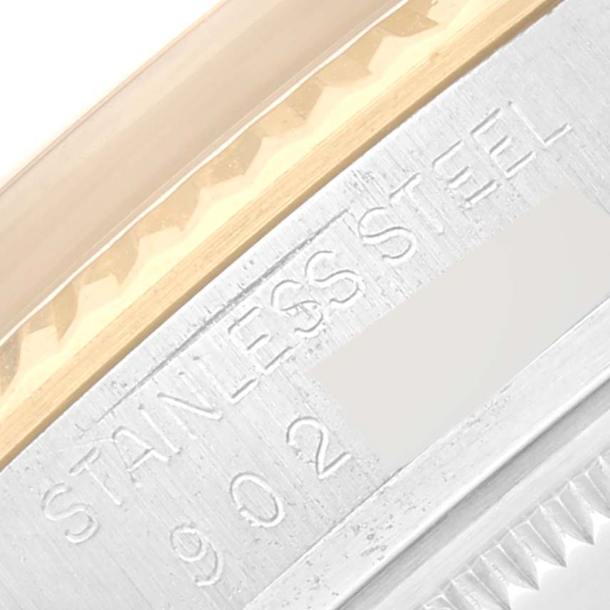 This close-up shows the side engraving on the stainless steel casing and bezel edge of the Datejust model by Rolex.