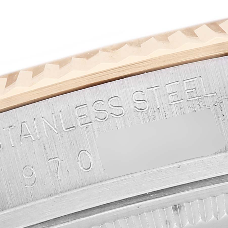 The image shows a close-up of the case side and bezel of a Rolex Vintage Collection 16013 Men's Steel and Gold (two tone) Champagne Dial 16013 Men's Steel and Gold (two tone) Champagne Dial watch, highlighting the material and model number.