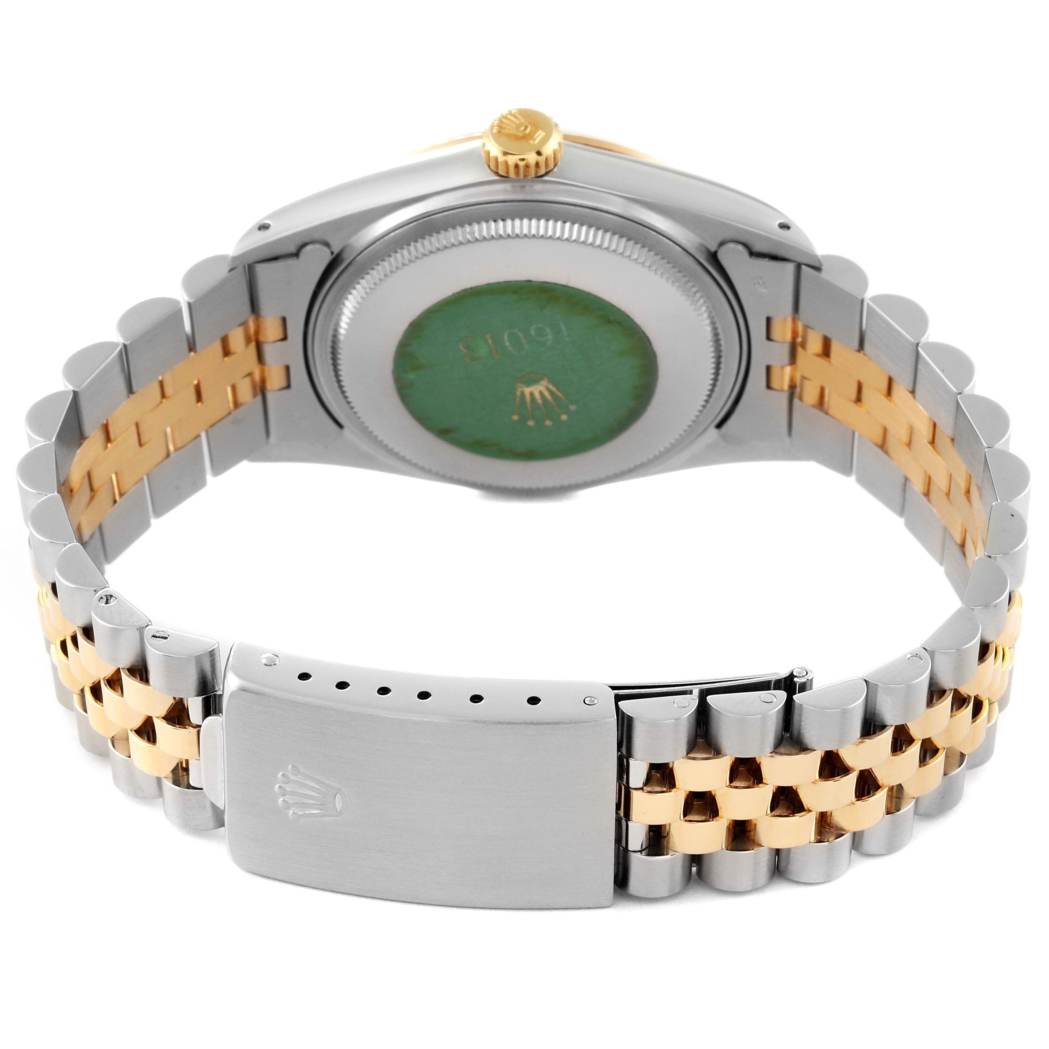 The image shows the back and bracelet of a Rolex Vintage Collection 16013 Men's Steel and Gold (two tone) Champagne Dial 16013 Men's Steel and Gold (two tone) Champagne Dial watch, highlighting its two-tone design and clasp.