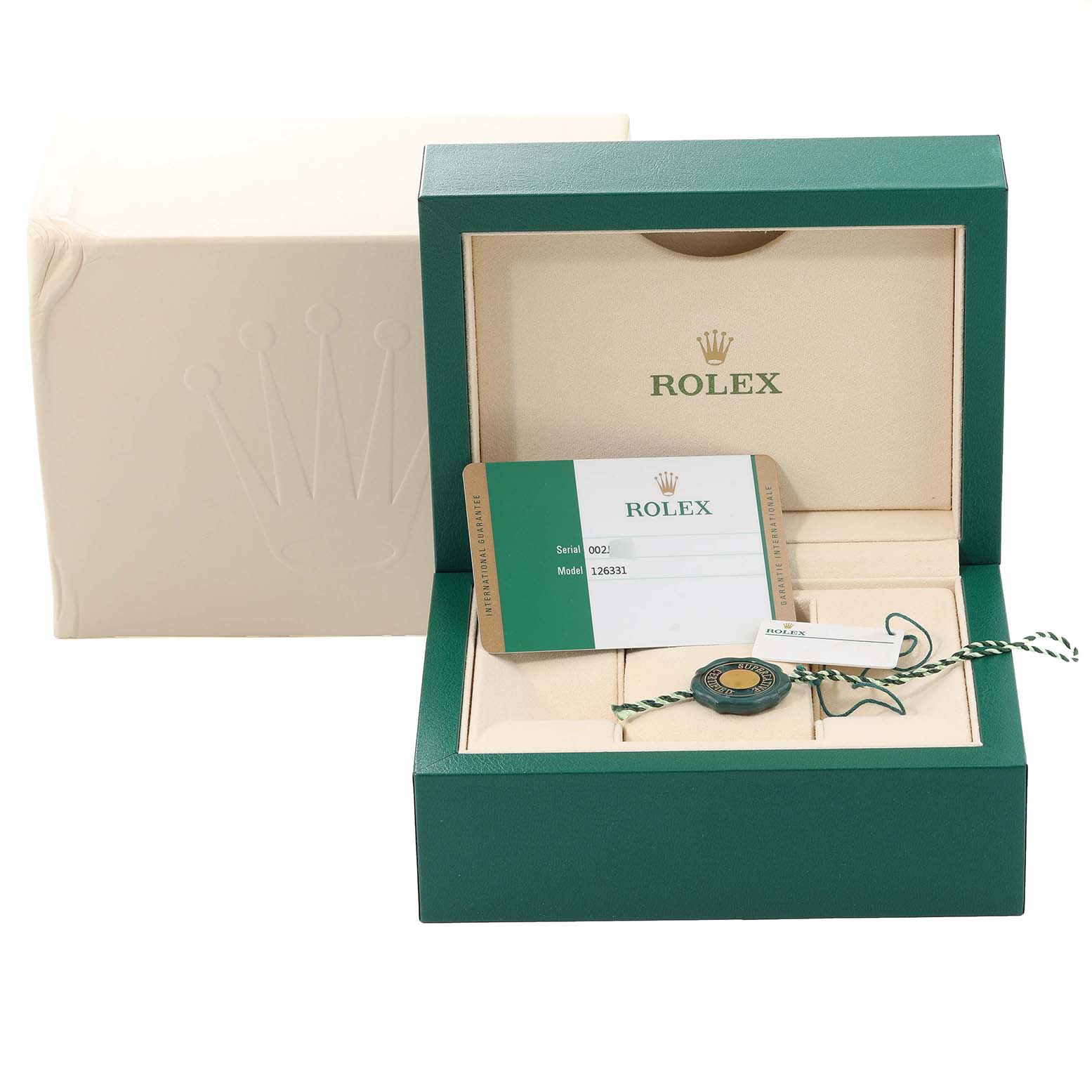 The image shows the packaging box and accessories for a Rolex Datejust 41 126331 Men's Steel and Gold (two tone) Pink Dial 126331 Men's Steel and Gold (two tone) Pink Dial, including an international warranty card and hang tag.