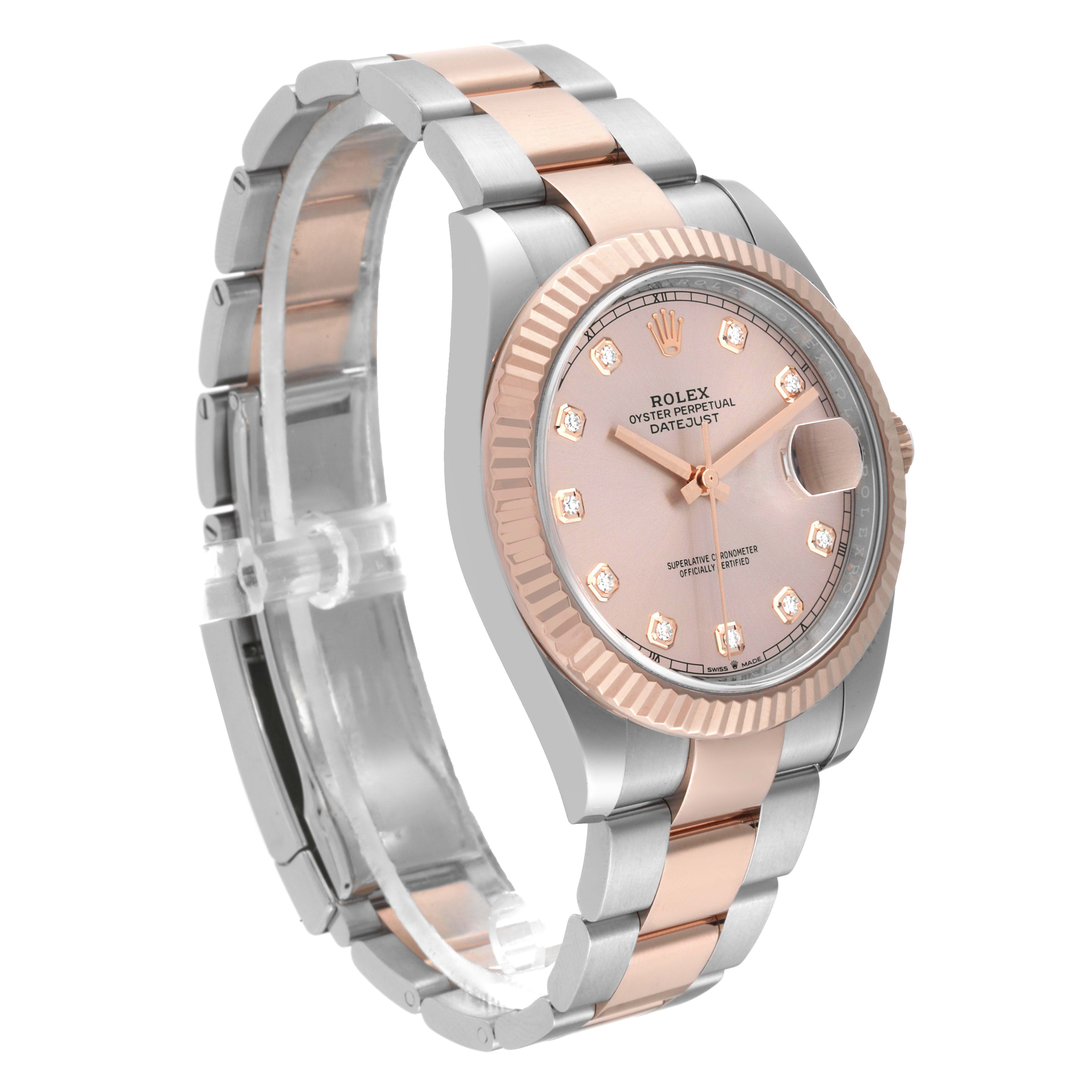 This image shows a side angle view of the Rolex Datejust 41 126331 Men's Steel and Gold (two tone) Pink Dial 126331 Men's Steel and Gold (two tone) Pink Dial, highlighting its two-tone bracelet, fluted bezel, and diamond hour markers.