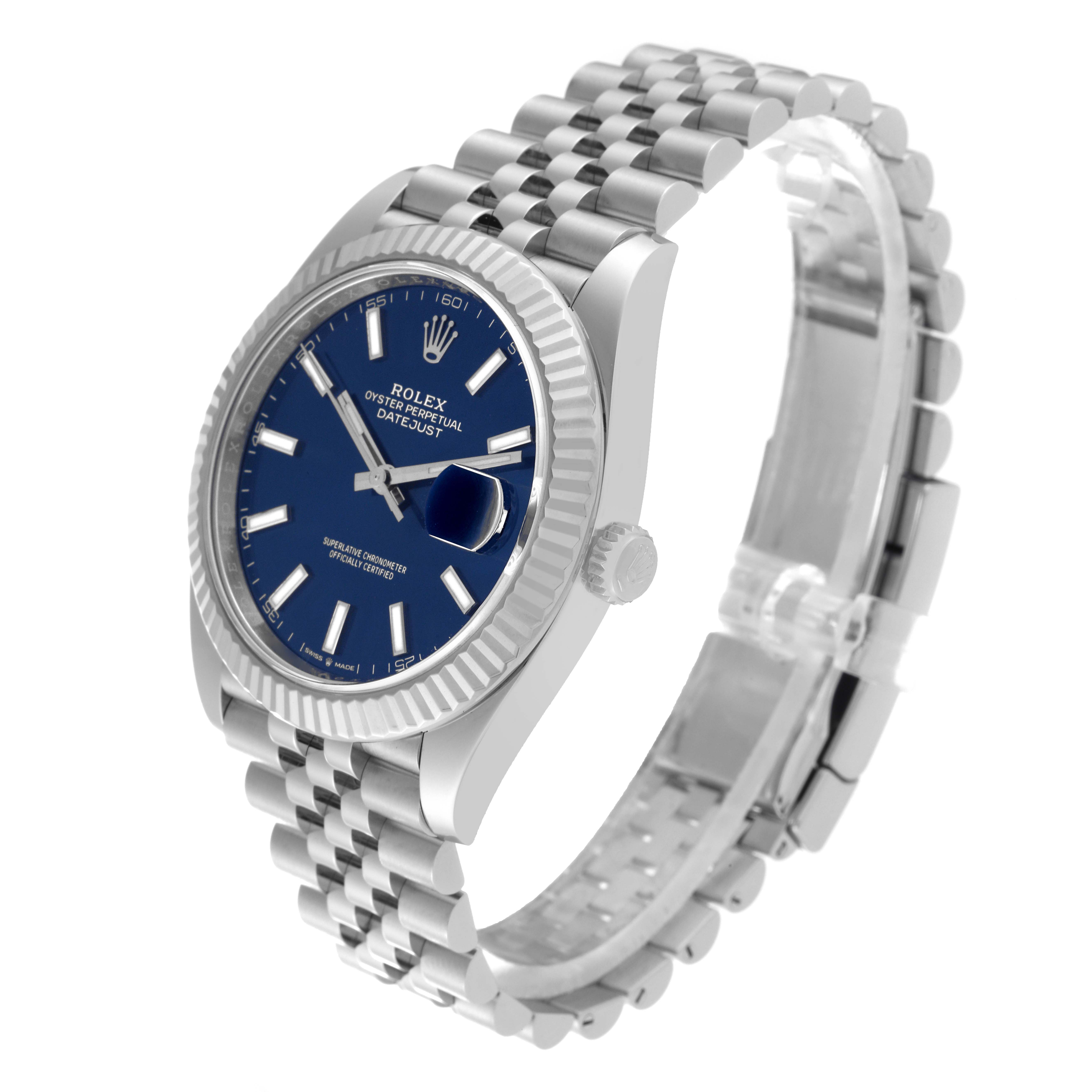 The image shows a Rolex Datejust 41 126334 Men
s Stainless Steel Blue Dial 126334 Men
s Stainless Steel Blue Dial watch at a slight angle, highlighting its blue dial, fluted bezel, and Jubilee bracelet.