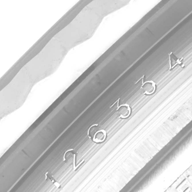 This image shows a close-up of the serial number engraving inside the bezel of a Rolex Datejust 41 126334 Men
s Stainless Steel Blue Dial 126334 Men
s Stainless Steel Blue Dial watch.