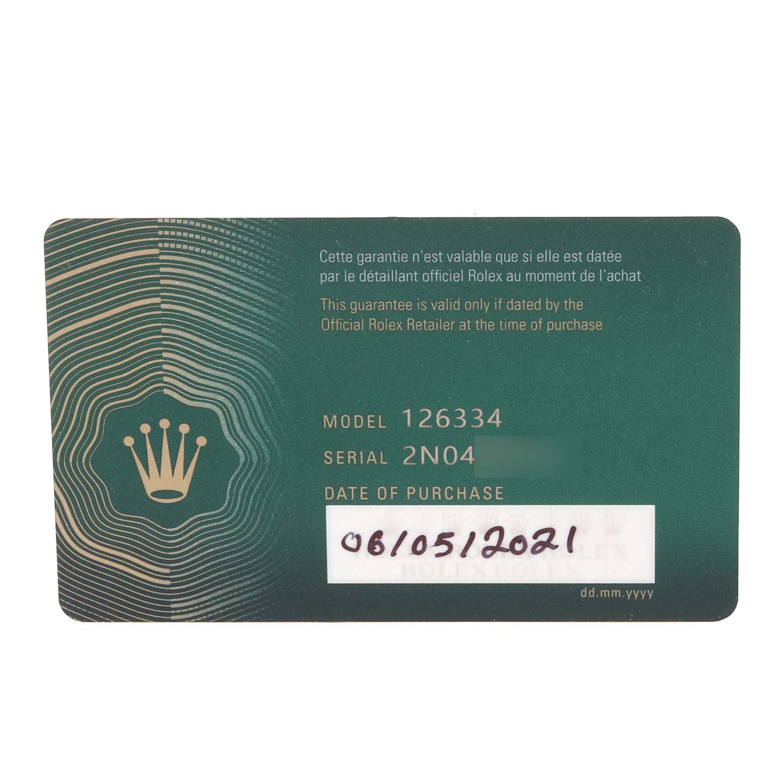 This image shows a Rolex warranty card for the Datejust 41 model, with the model number, serial number, and date of purchase.