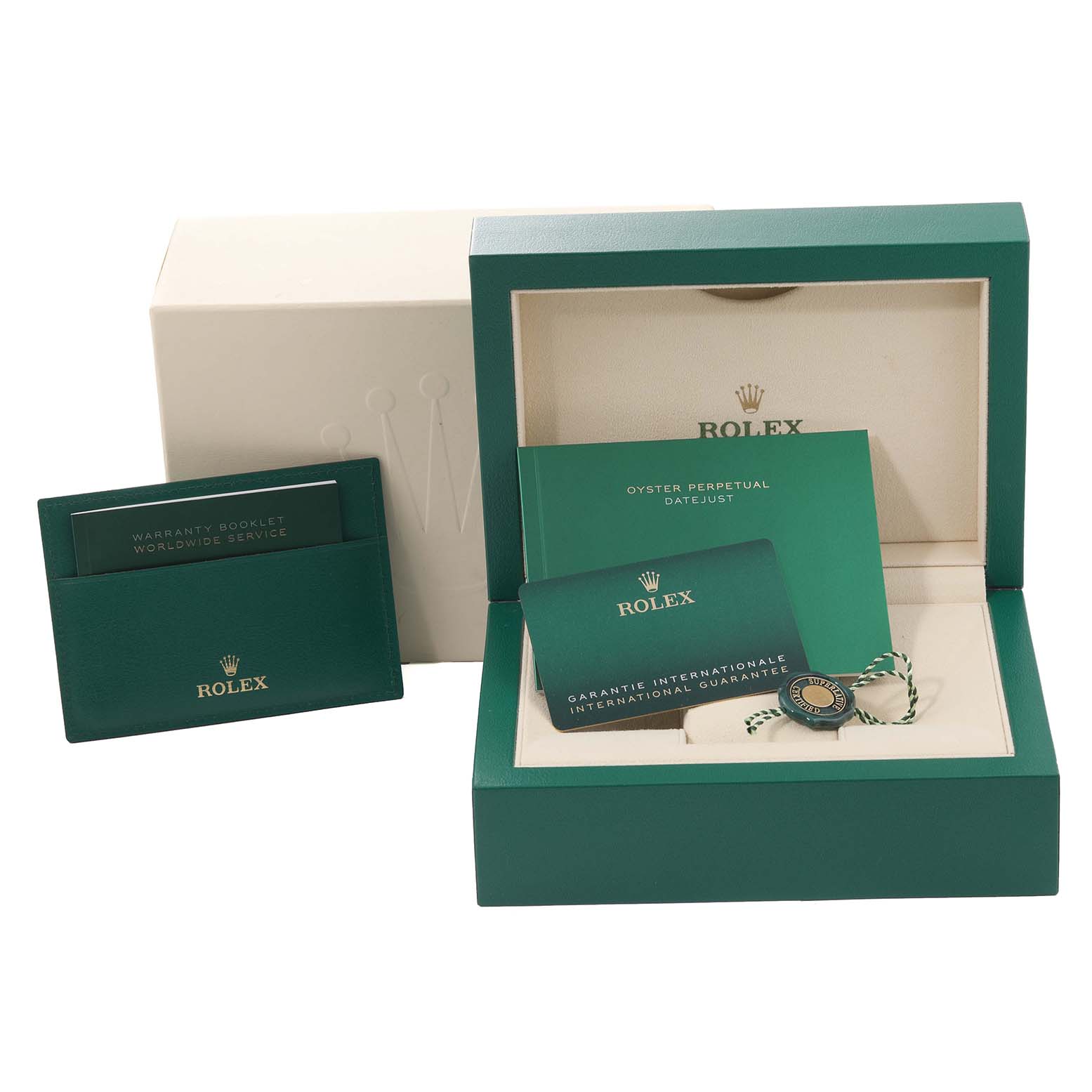 This image shows the packaging and accessories for a Rolex Datejust 41 126334 Men
s Stainless Steel Blue Dial 126334 Men
s Stainless Steel Blue Dial, including the box, warranty booklet, and international guarantee card.