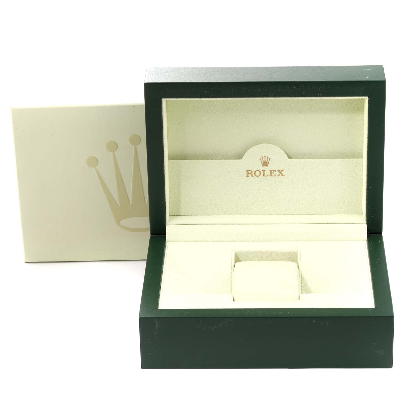 The image shows an open Rolex Datejust 116200 Men's Stainless Steel Black Dial 116200 Men's Stainless Steel Black Dial watch box with its interior on display, revealing the cushion and holder.