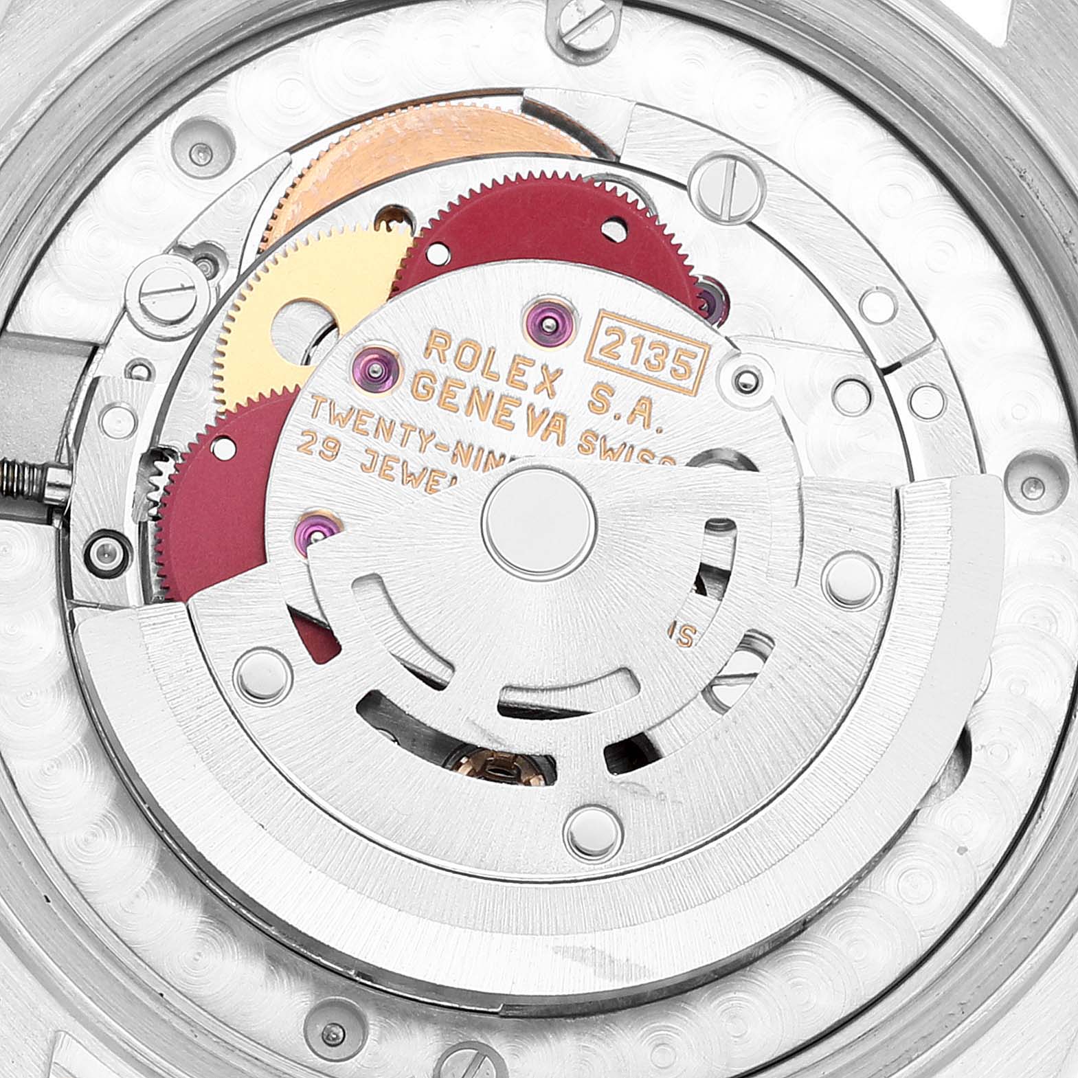 This image shows the internal movement mechanism of a Rolex Mid-Size 68273 Women's Steel and Gold (two tone) Champagne Dial 68273 Women's Steel and Gold (two tone) Champagne Dial watch, highlighting gears and inscriptions.