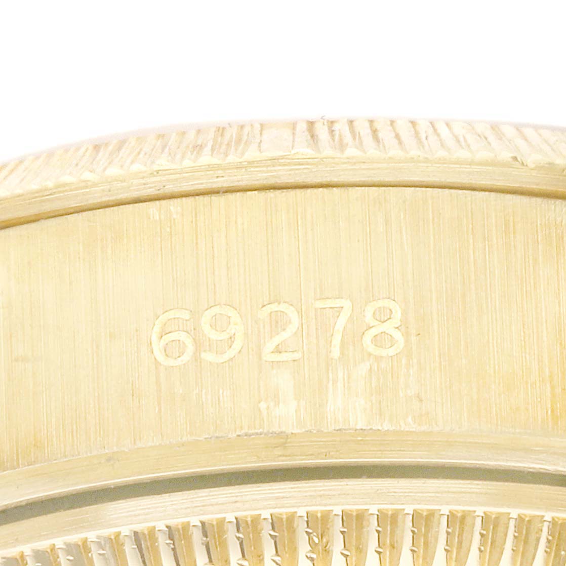 This image shows a close-up view of the model number 69278 on the case of a Rolex Datejust 69278 Women's Yellow Gold Champagne Dial 69278 Women's Yellow Gold Champagne Dial watch.