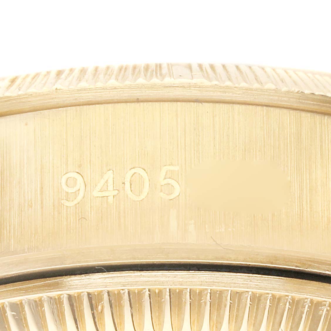 This image shows the engraved model number on the case of a Rolex Datejust 69278 Women's Yellow Gold Champagne Dial 69278 Women's Yellow Gold Champagne Dial watch from a close-up angle.