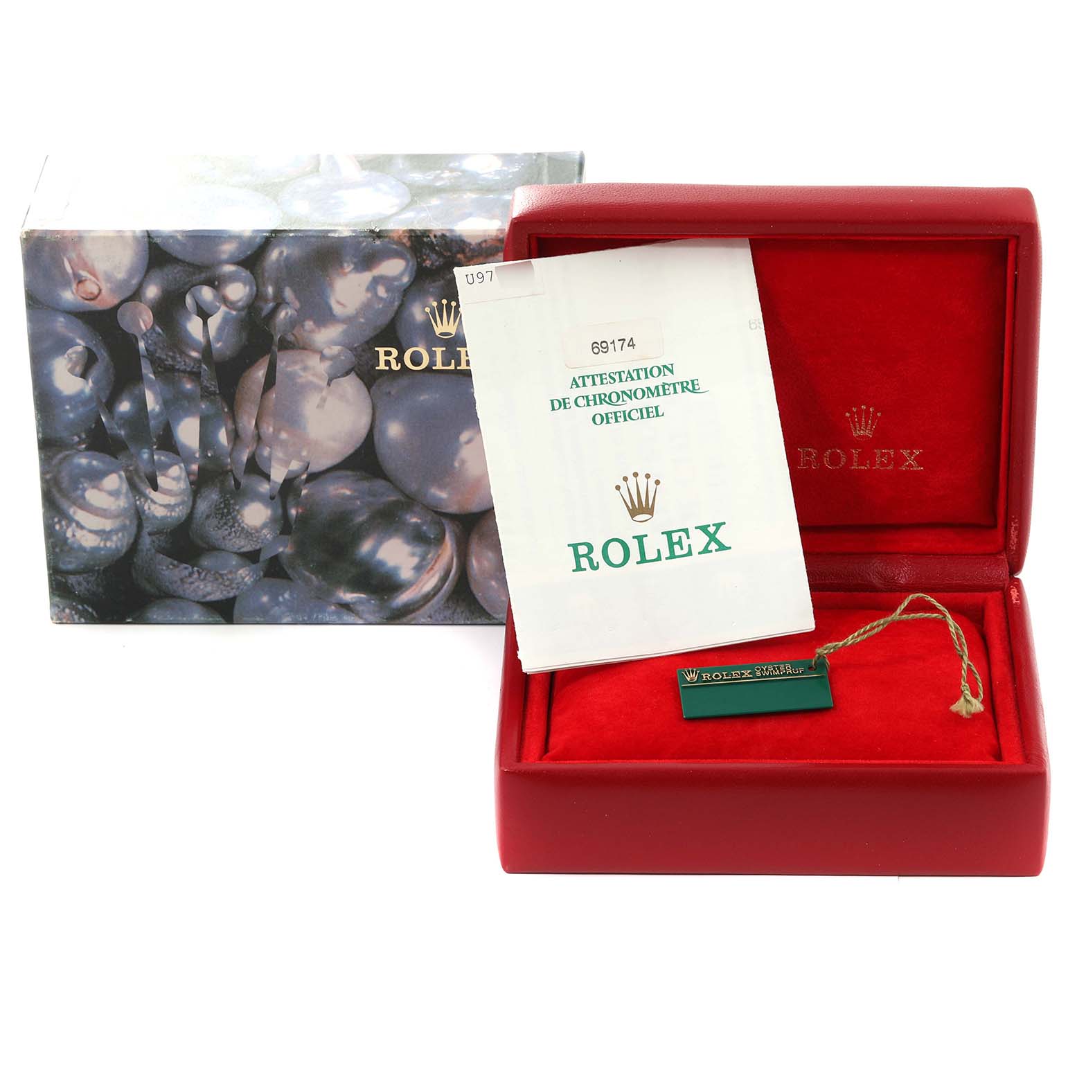 The image shows a Rolex Datejust 69174G Women's Stainless Steel Silver Dial 69174G Women's Stainless Steel Silver Dial model's packaging, including a box, certificate, and a green Rolex tag inside a red case.