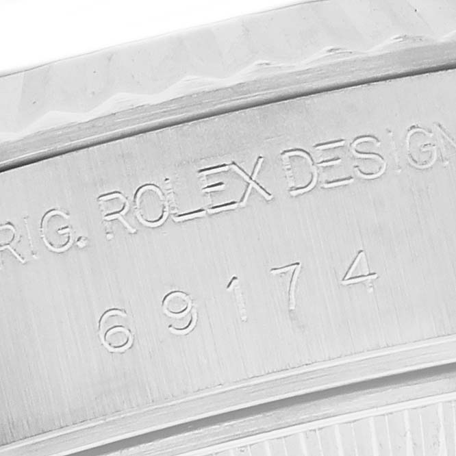 This image shows a close-up of the engraved model number on the case of a Rolex Datejust 69174G Women's Stainless Steel Silver Dial 69174G Women's Stainless Steel Silver Dial watch.