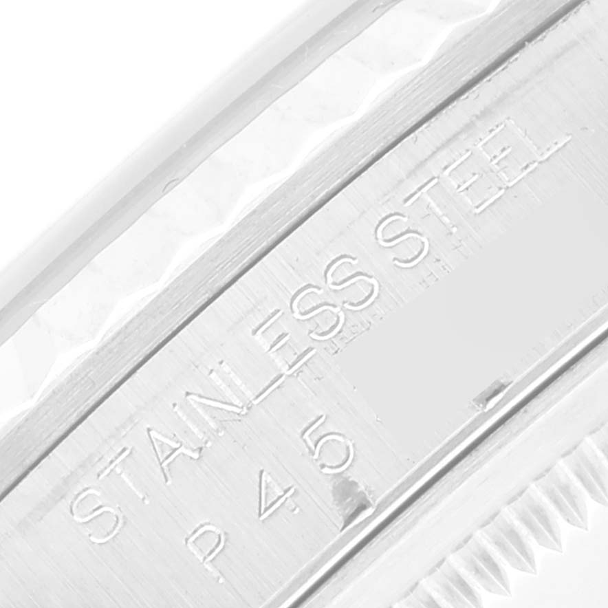 This is a close-up image of the stainless steel casing of a Rolex Datejust 16234 Men's Stainless Steel Pink Dial 16234 Men's Stainless Steel Pink Dial model, showing the edge and engraved details.