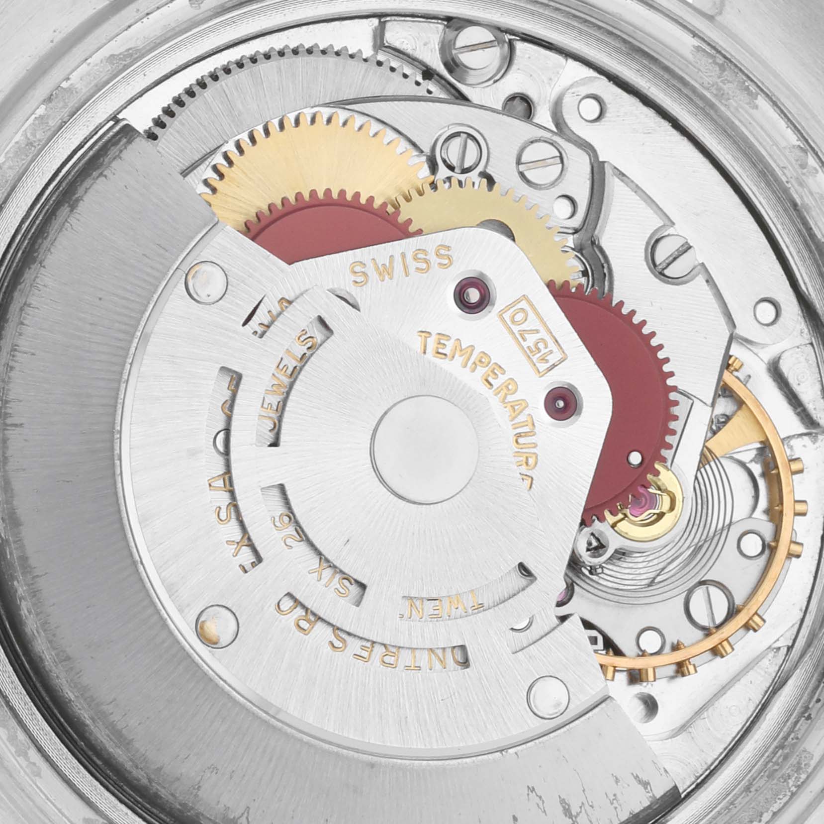 The image shows the internal mechanism and gears of a Rolex Vintage Collection 1601 Men's Stainless Steel Grey Dial 1601 Men's Stainless Steel Grey Dial model watch, viewed up close.