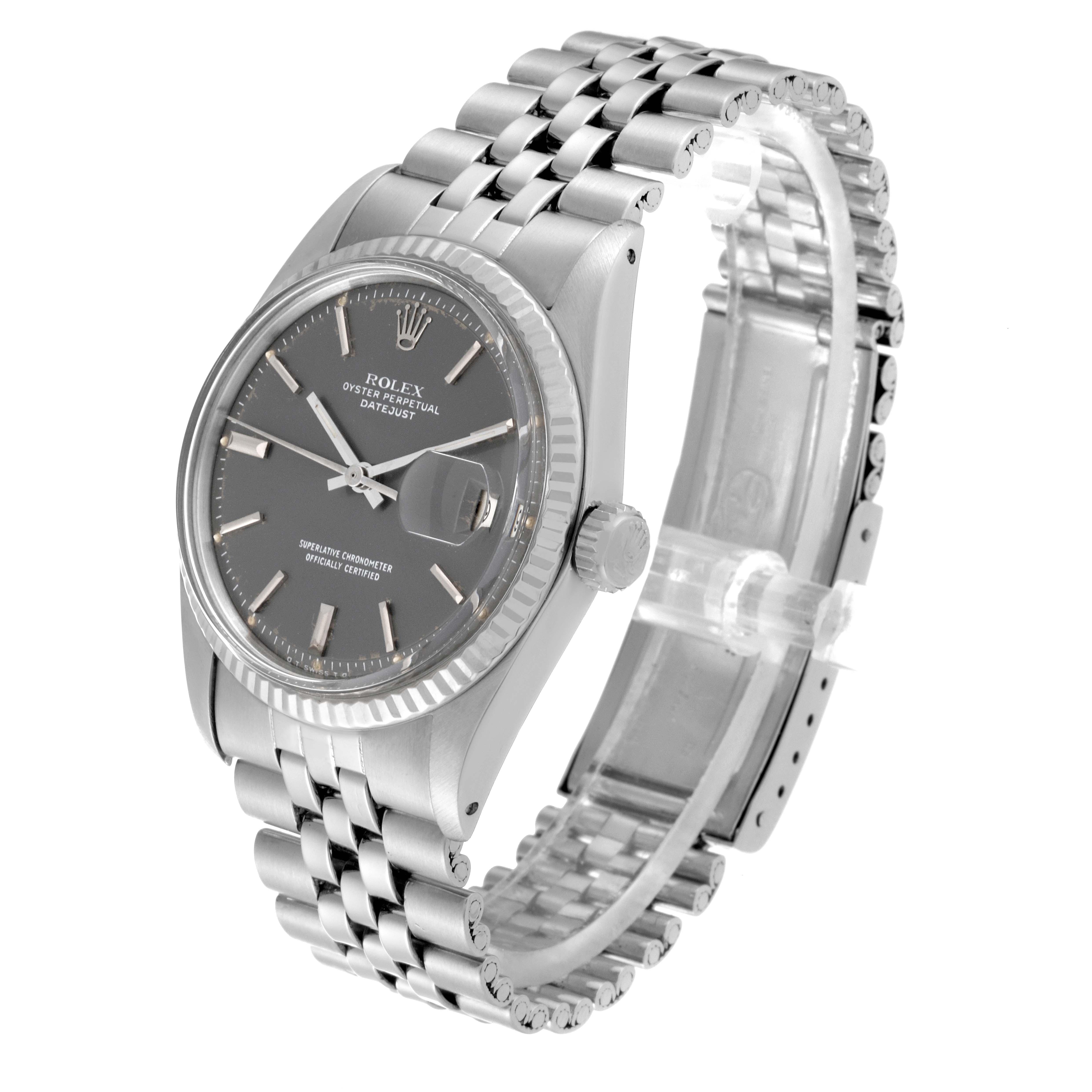 The image shows a side view of the Rolex Vintage Collection 1601 Men's Stainless Steel Grey Dial 1601 Men's Stainless Steel Grey Dial Oyster Perpetual Datejust watch, highlighting its face, bezel, and bracelet.